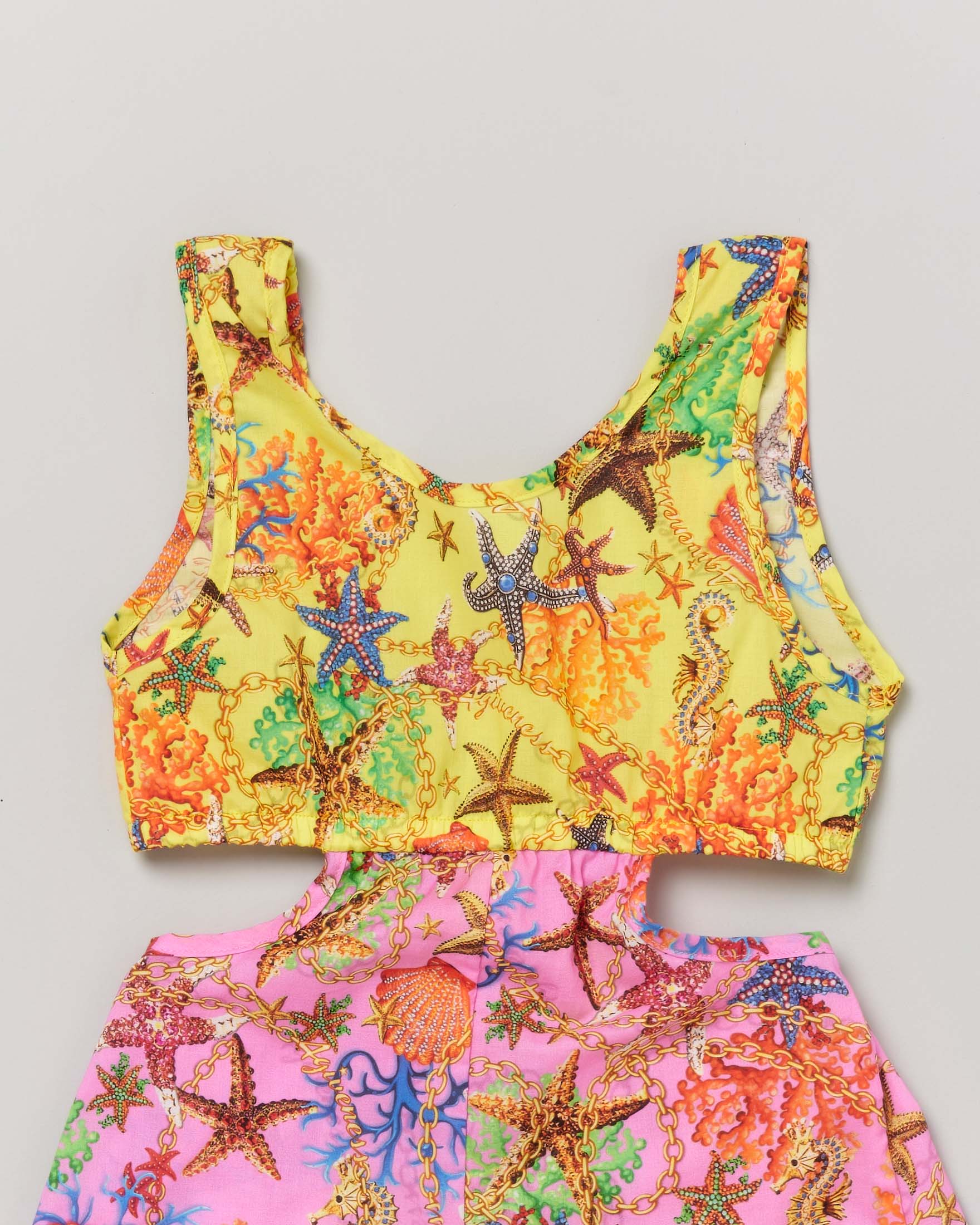Tutina copricostume gialla e fucsia a fantasia stelle marine con cut-out ai fianchi  image