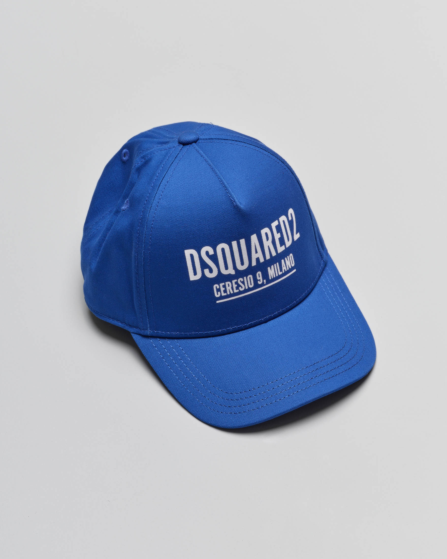 Berretto blu royal con frontino e logo stampato