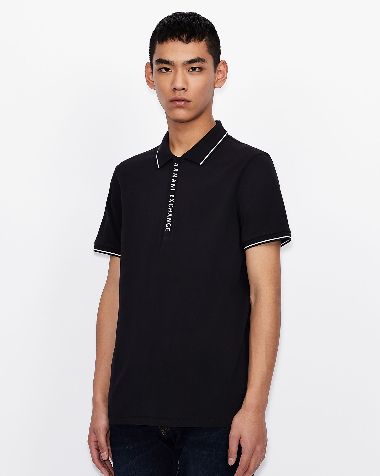 Polo blu mezza manica in jersey di cotone stretch con chiusura zip coperta