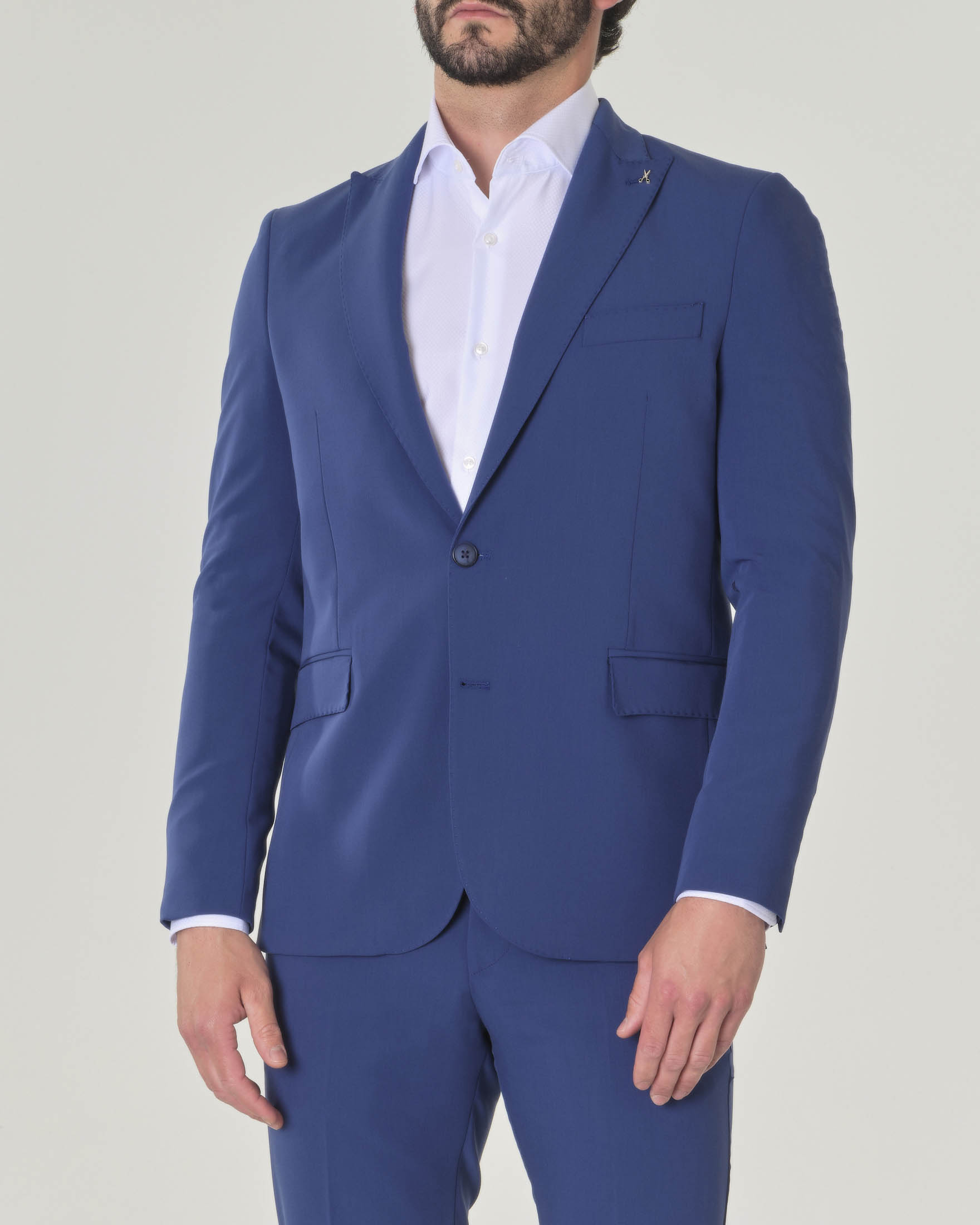 Abito blu indaco in tela di viscosa stretch con rever a lancia image