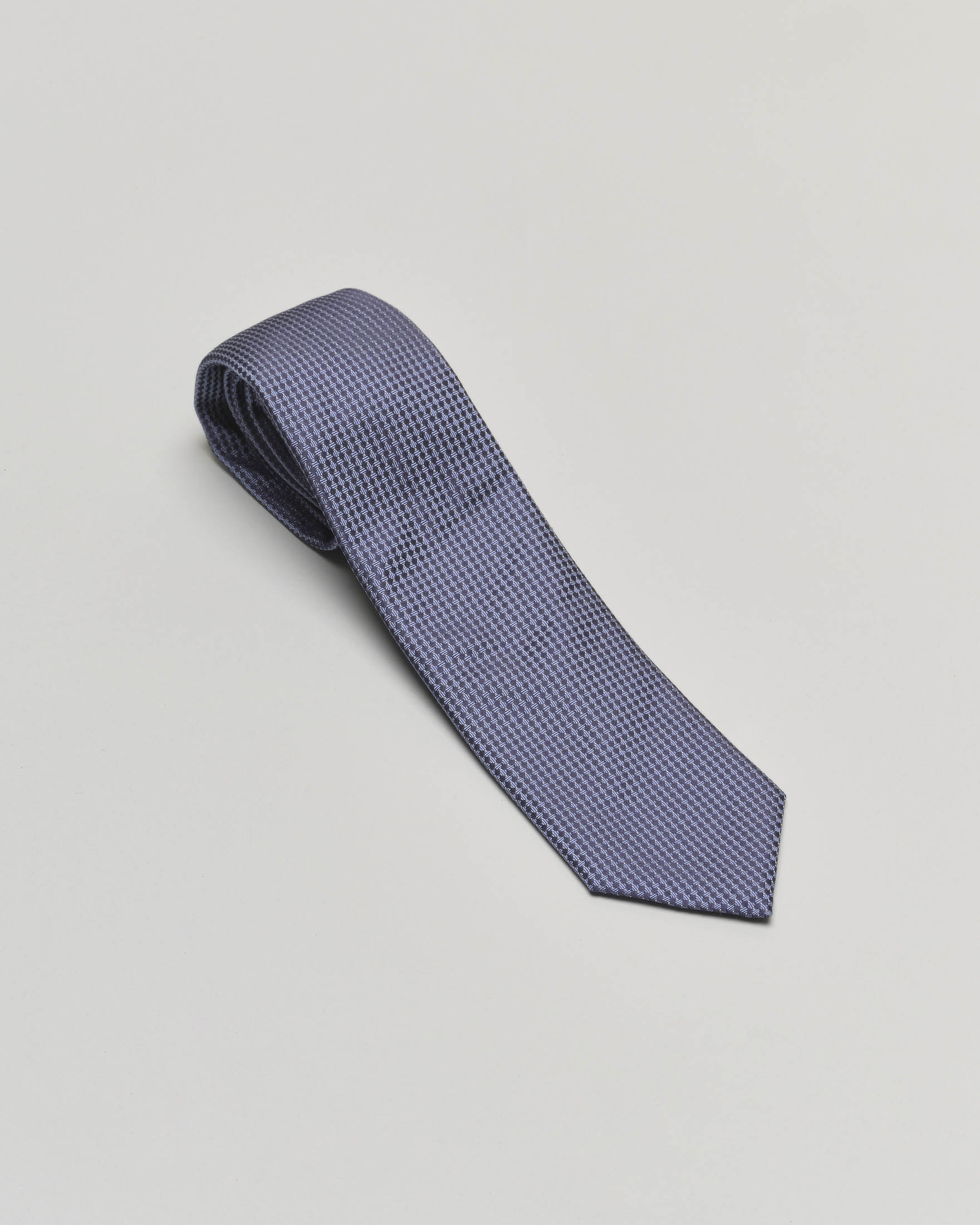 Cravatta blu con micro fantasia in pura seta