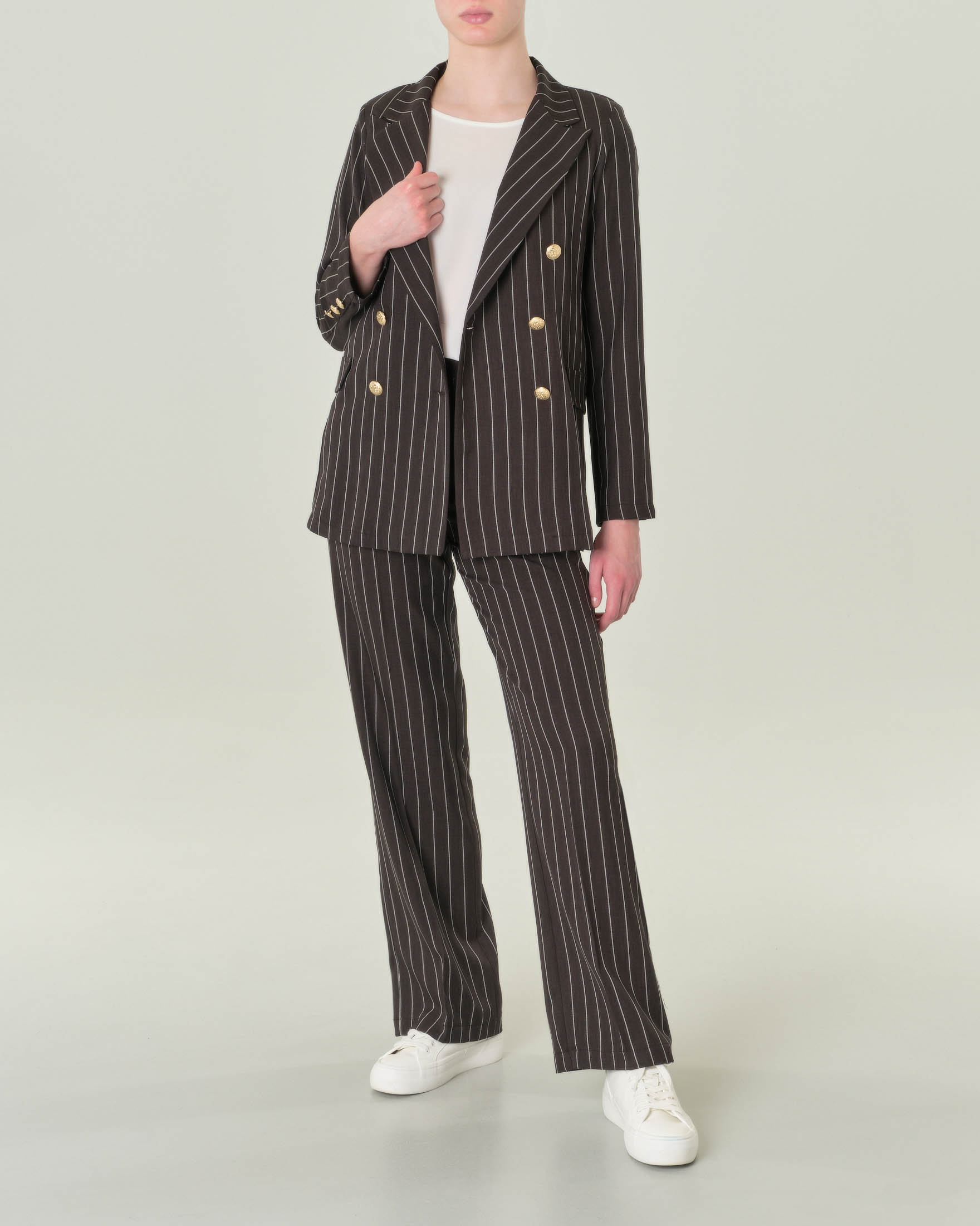 Pantaloni straight neri gessati in bianco