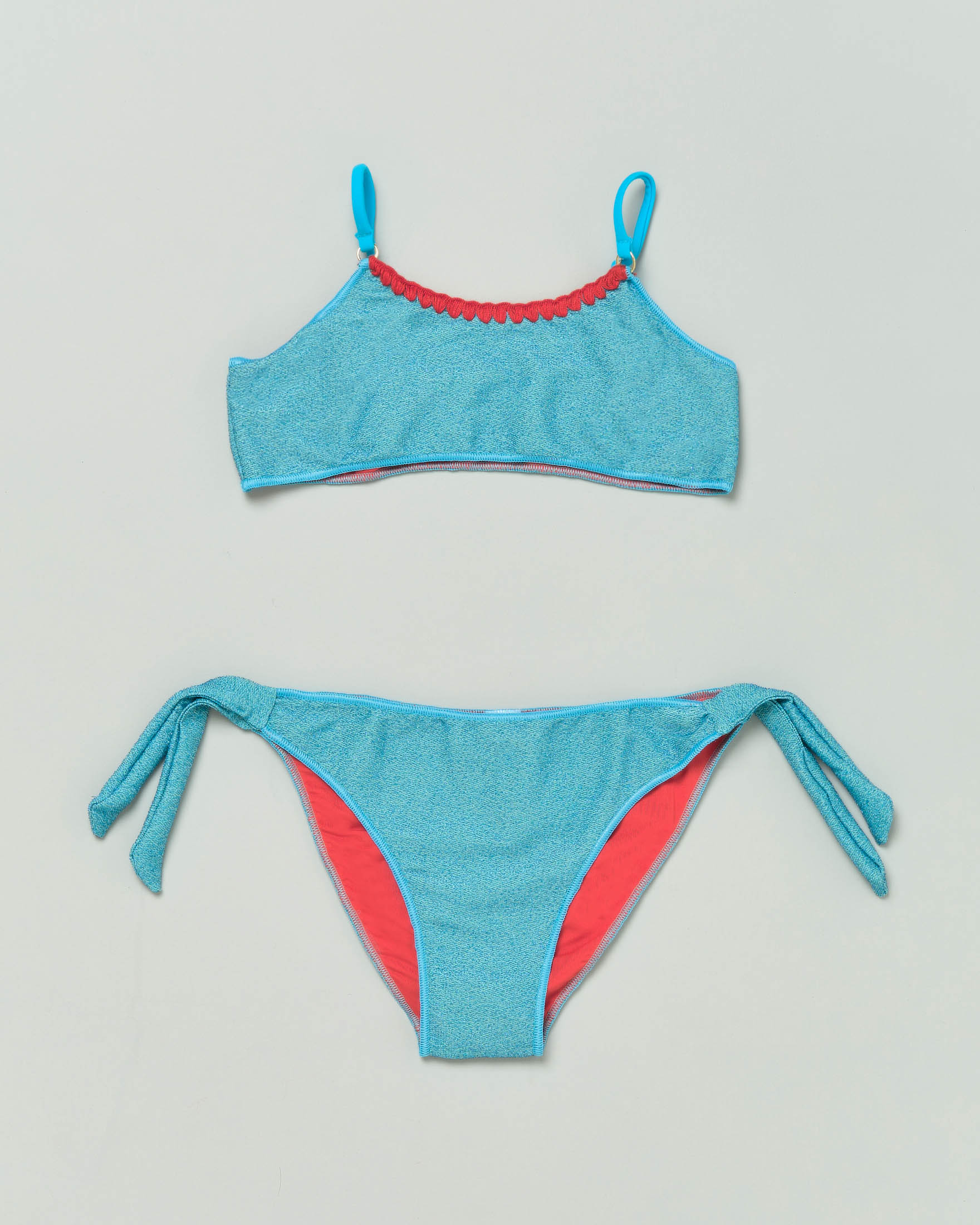 Bikini a fascia azzurro in tessuto stretch con lurex