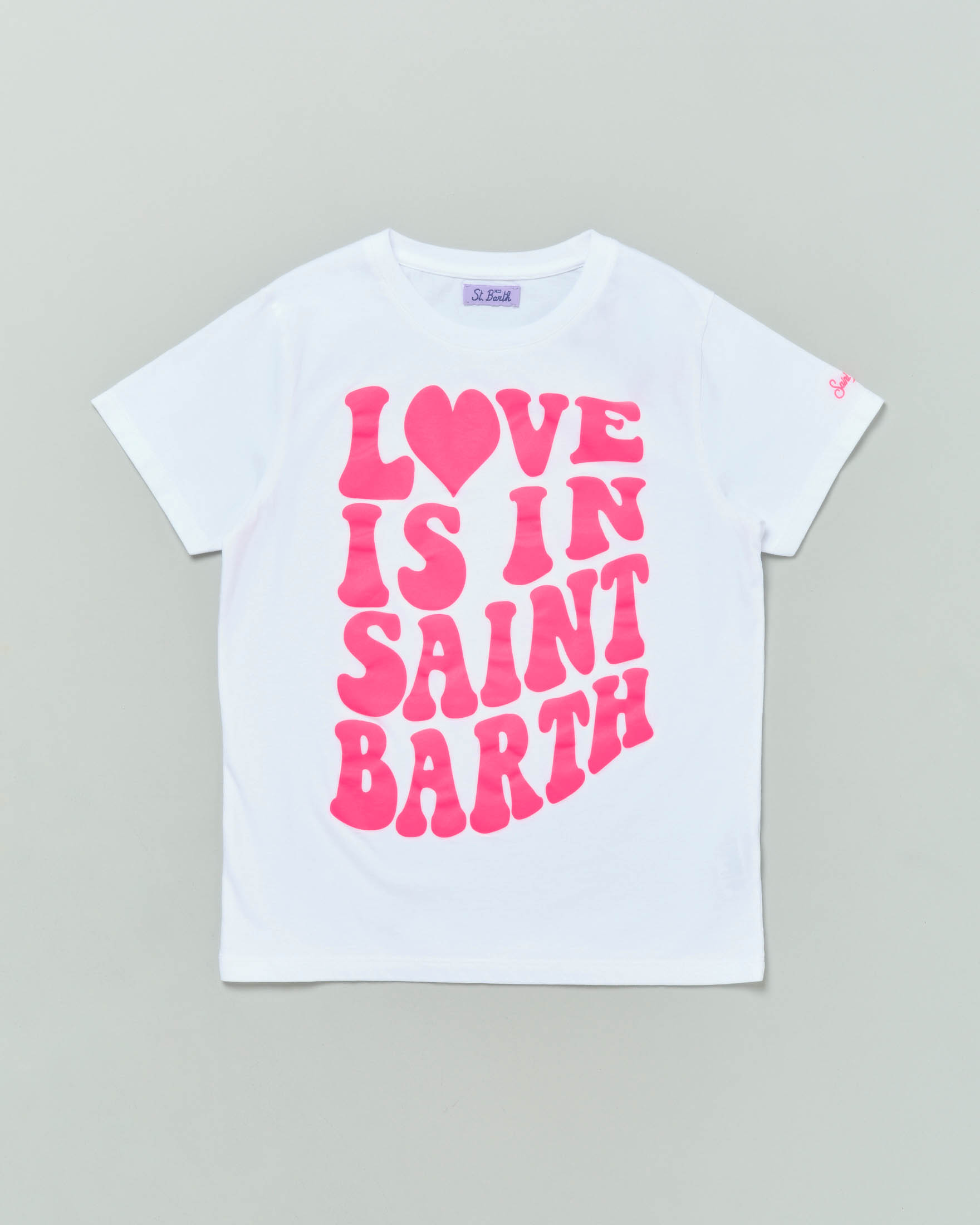 T shirt bianca a mezza manica in cotone con stampa Love is in Saint Barth fucsia