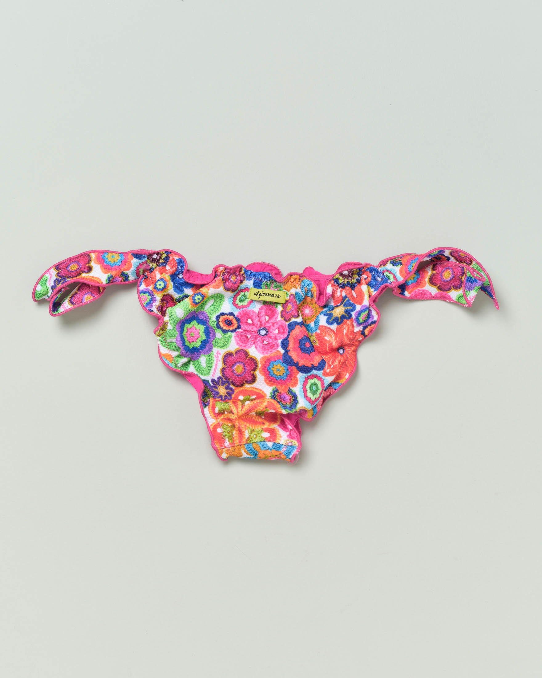 Slip bikini in tessuto stretch a fantasia crochet multicolor
