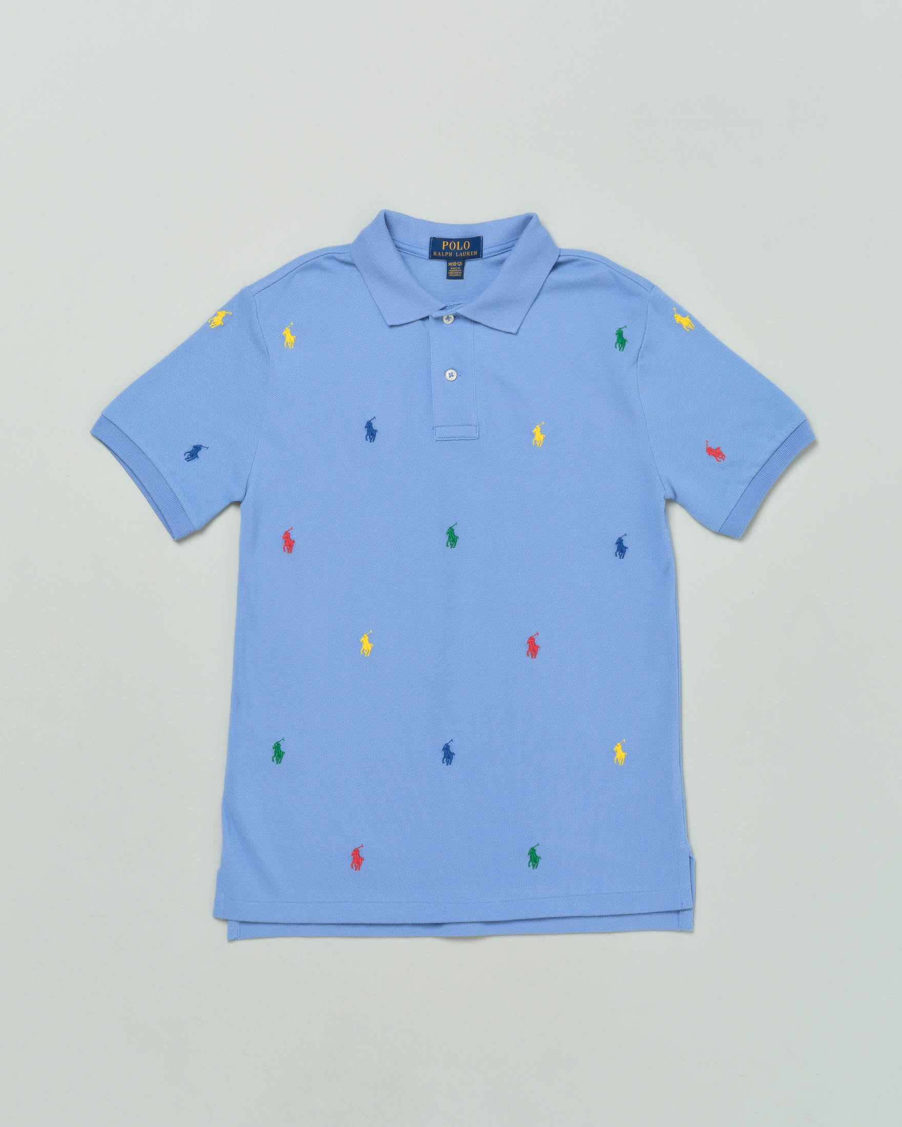 Polo celeste mezza manica in piquet di cotone con pony colorati all-over