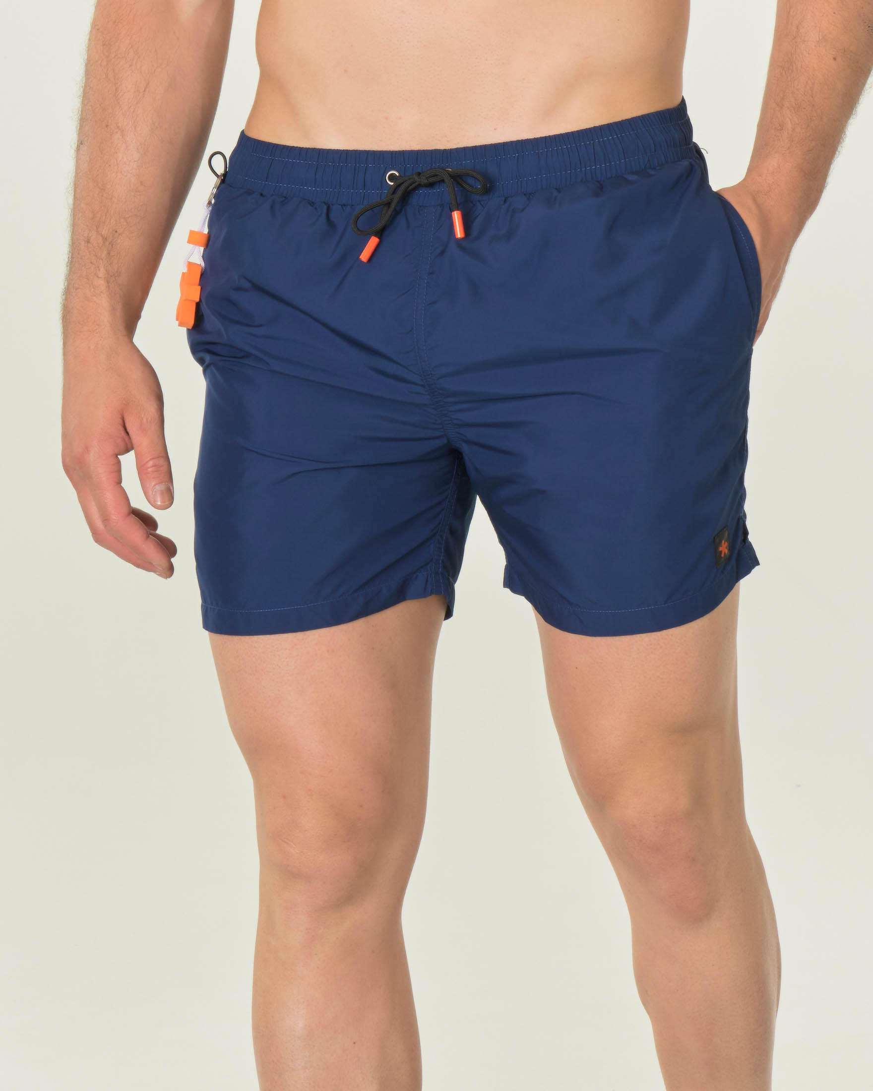 Boxer mare blu tinta unita con taschino sul retro