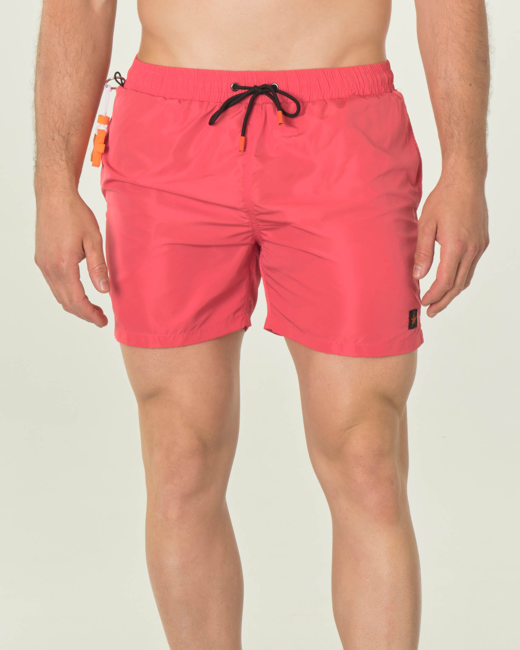 Boxer mare fucsia tinta unita con taschino sul retro