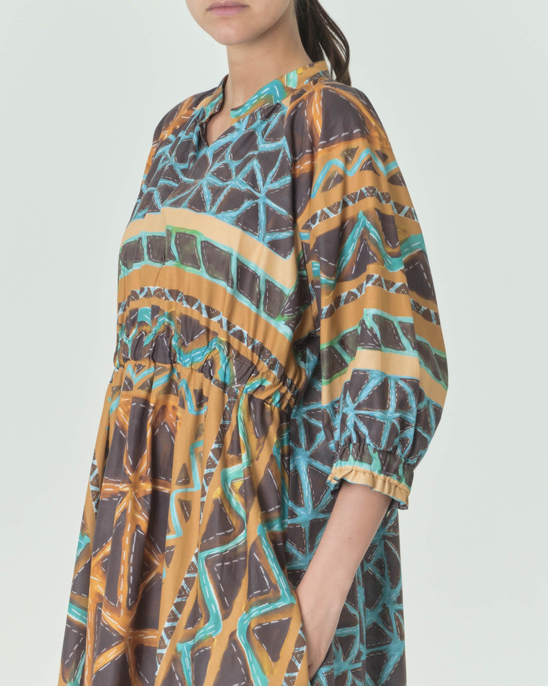 Abito lungo ampio color ocra in puro cotone a fantasia afro moro e turchese con maniche raglan image