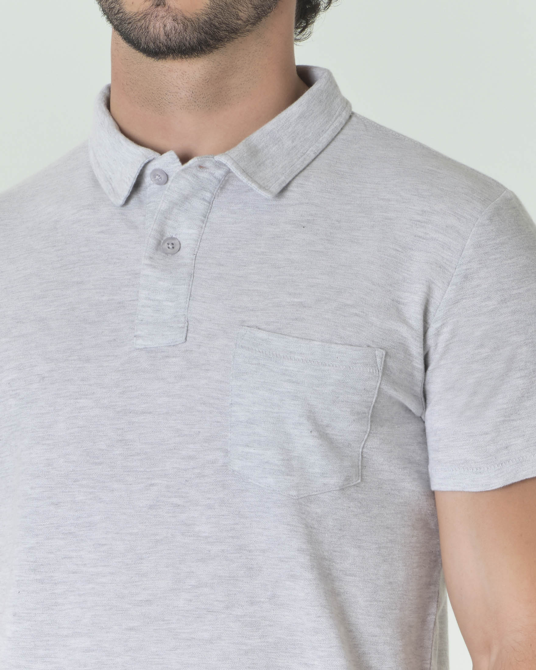 Polo grigio melange a mezza manica in misto lino e pima cotton con taschino sul petto image