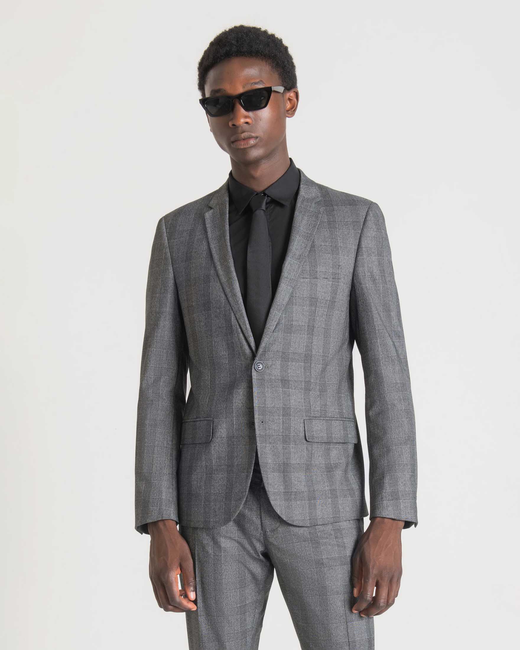 Blazer Principe di Galles grigio in tessuto stretch con chiusura monopetto