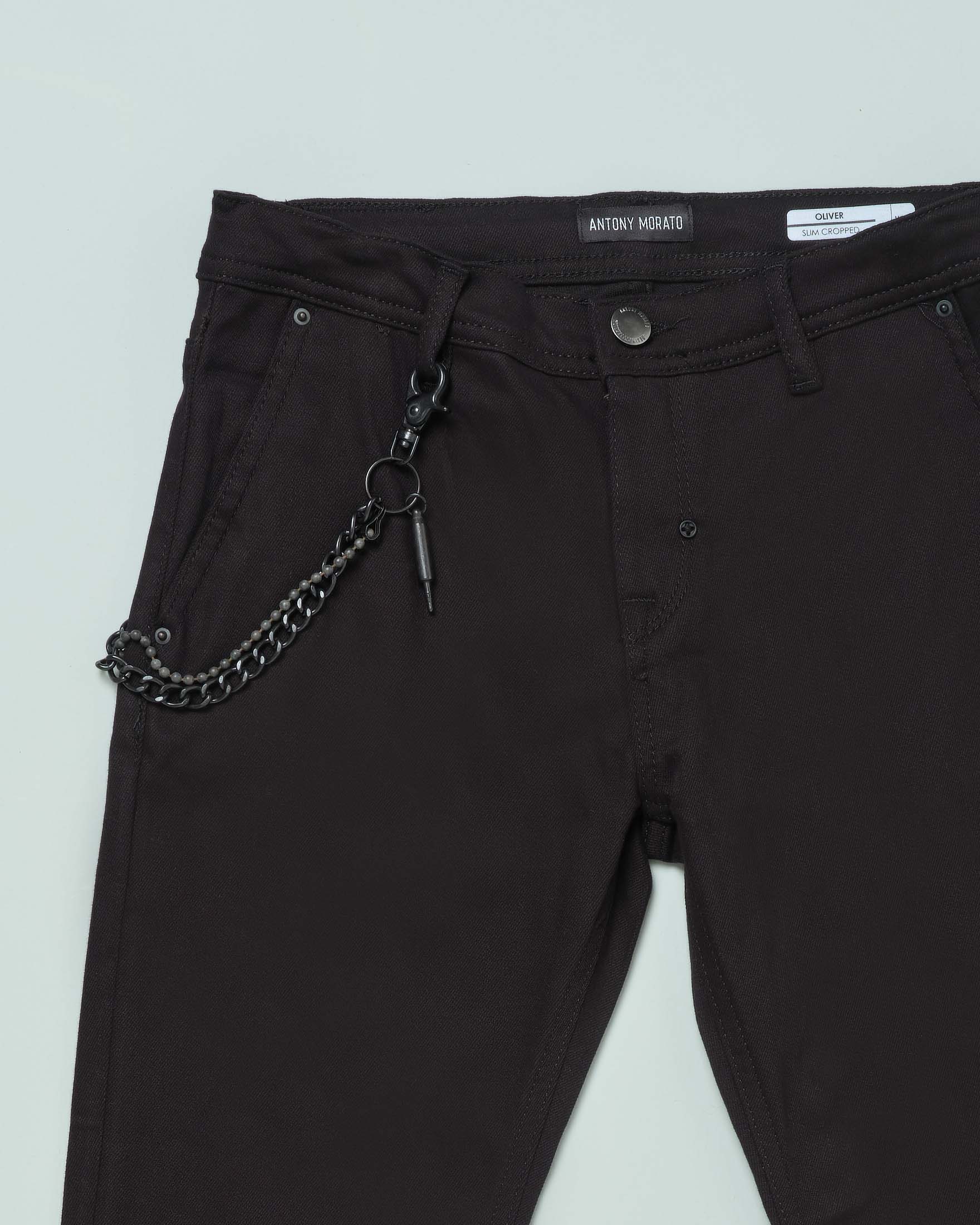 Pantalone nero slim-cropped in cotone stretch con catena  image