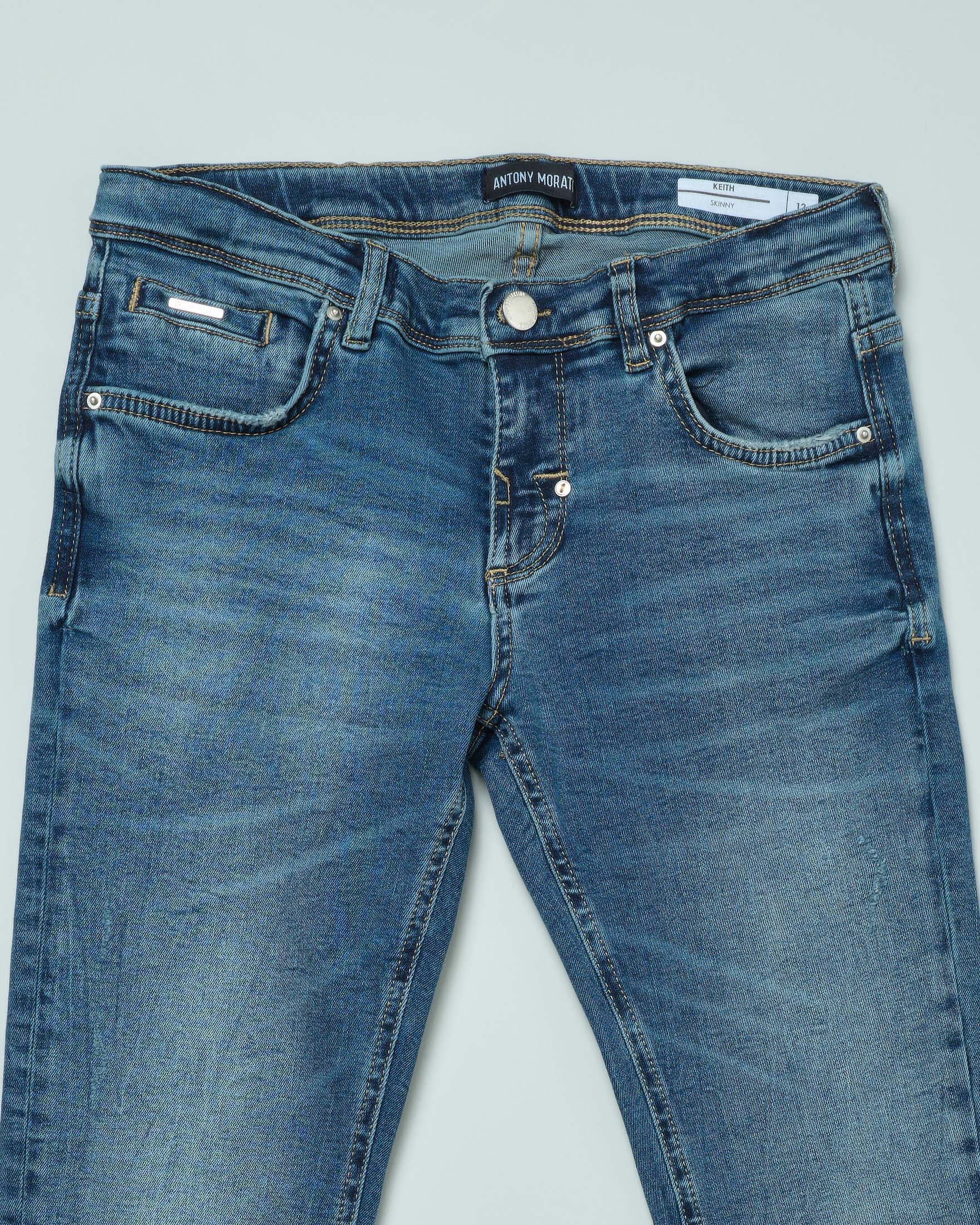 Jeans skinny a lavaggio medio stone washed in cotone stretch 10-16 anni image