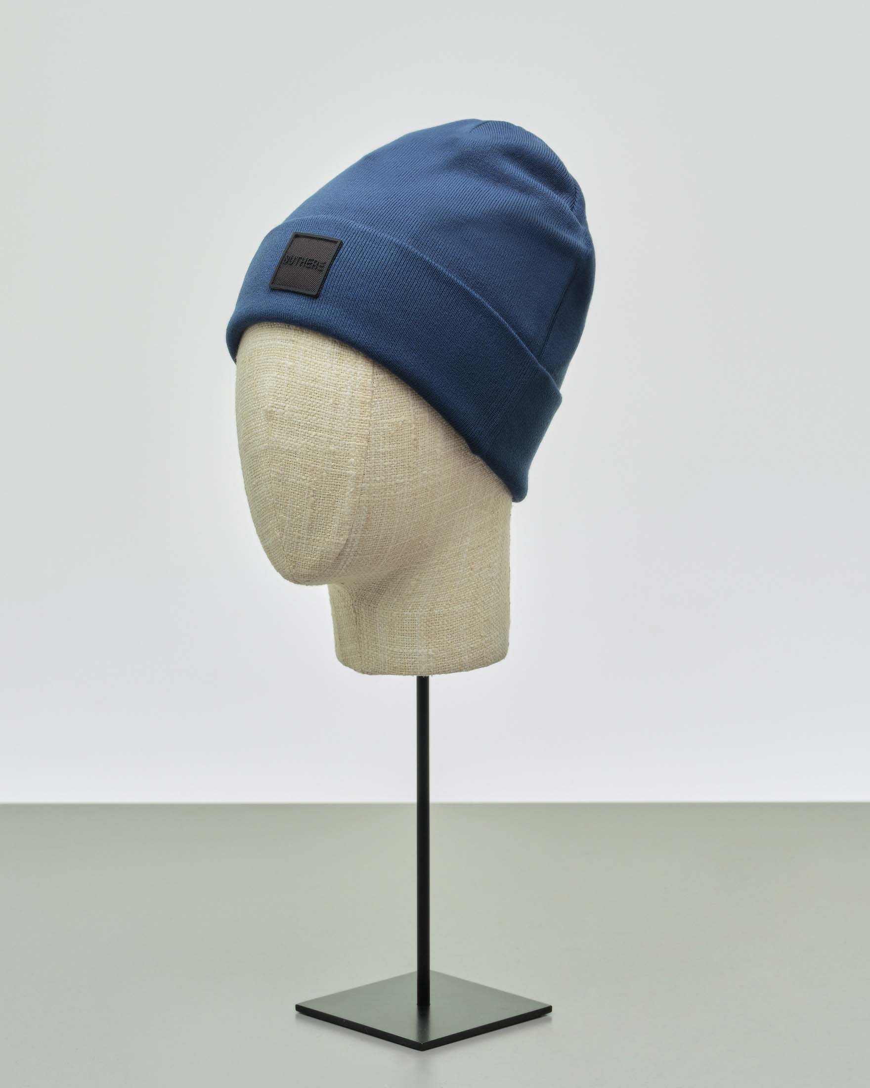 Berretto blu indaco in misto viscosa con risvolto e patch porta logo