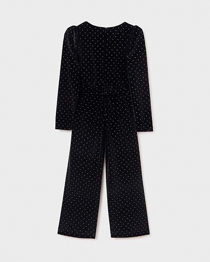 Tuta a maniche lunghe in velluto nero glitterato e fusciacca con