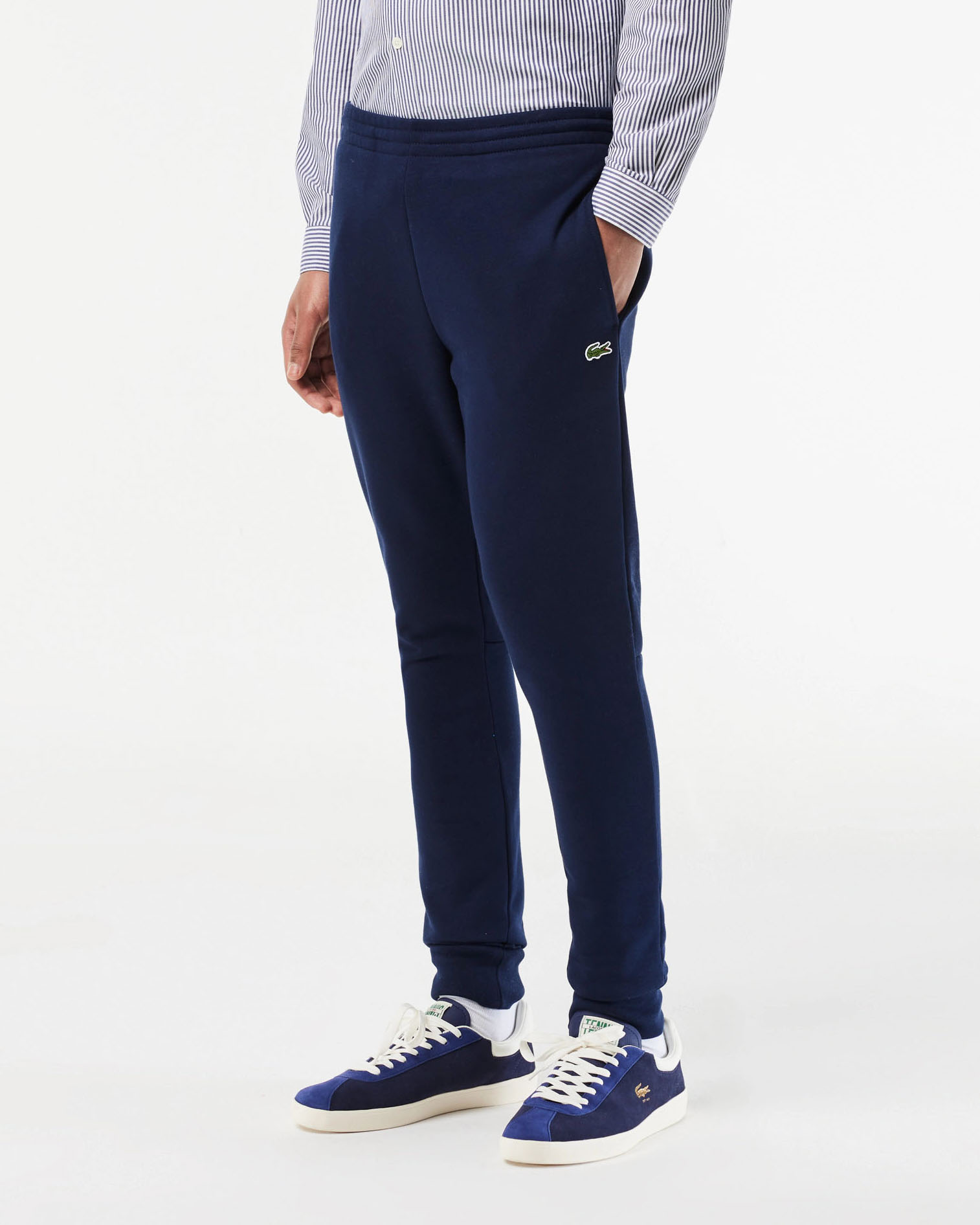 Pantaloni Lacoste blu in felpa di cotone con logo coccodrillo verde sul fianco