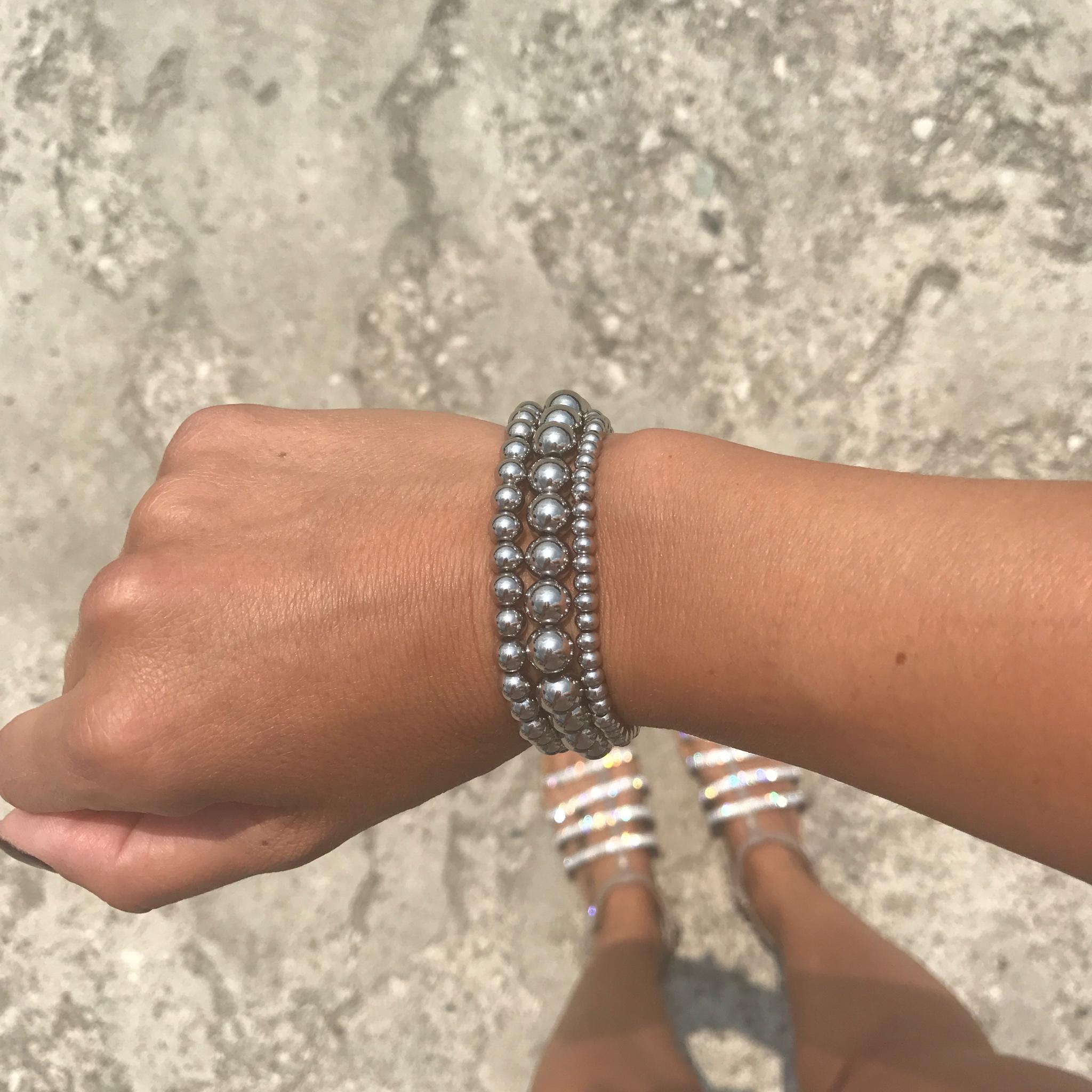 Bracciale di catena a palline con sfere sfaccettate di argento bianco