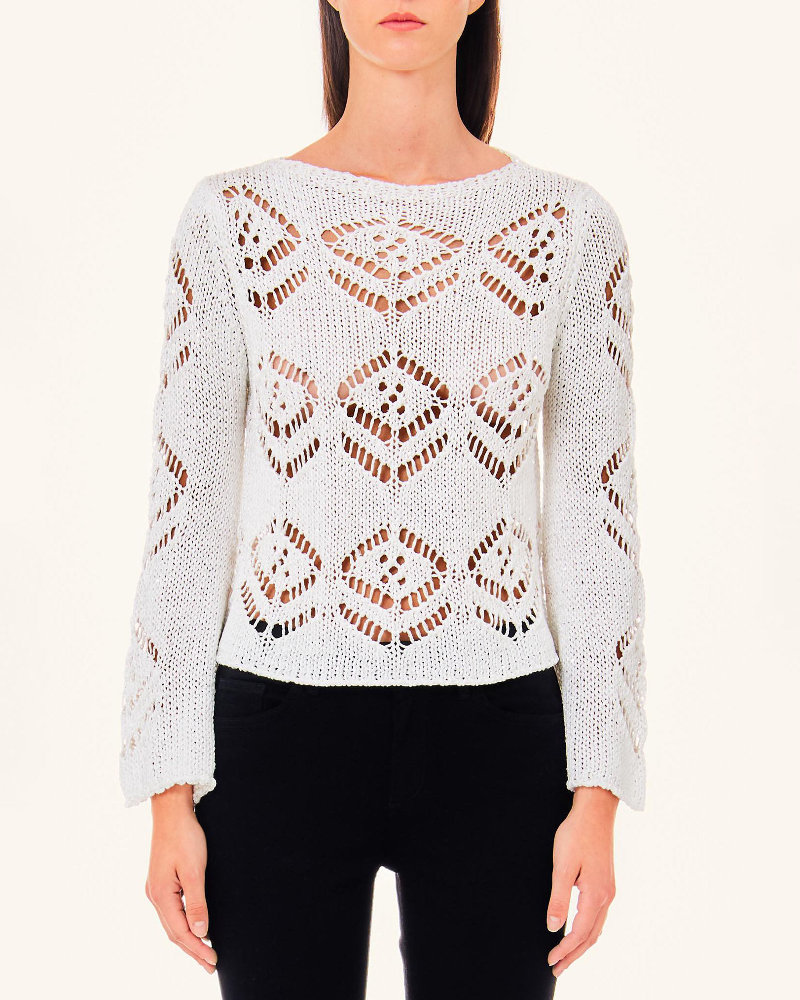 Maglia bianca a motivo traforato con scollo tondo