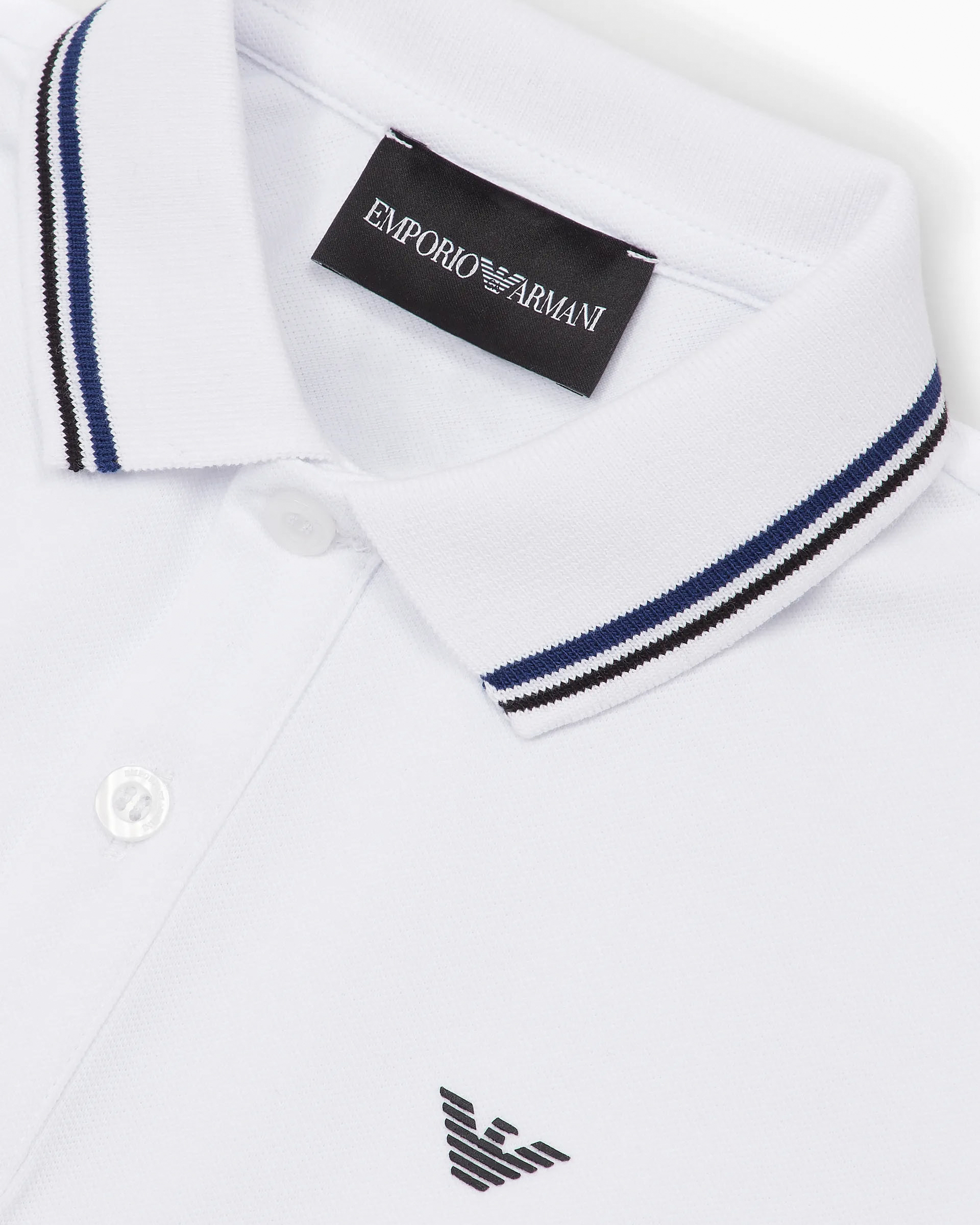 Polo bianca mezza manica Emporio Armani Junior in cotone stretch con bordino blu e nero  image