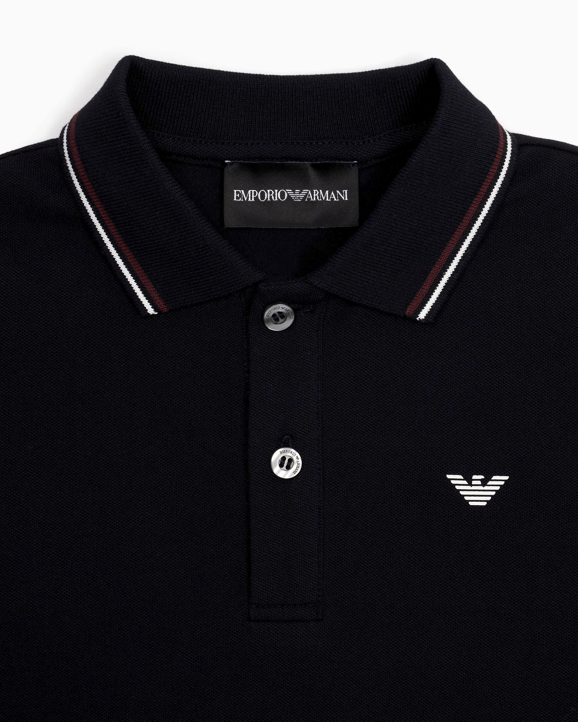 Polo blu mezza manica Emporio Armani Junior in cotone stretch con bordino bordeaux e bianco  image