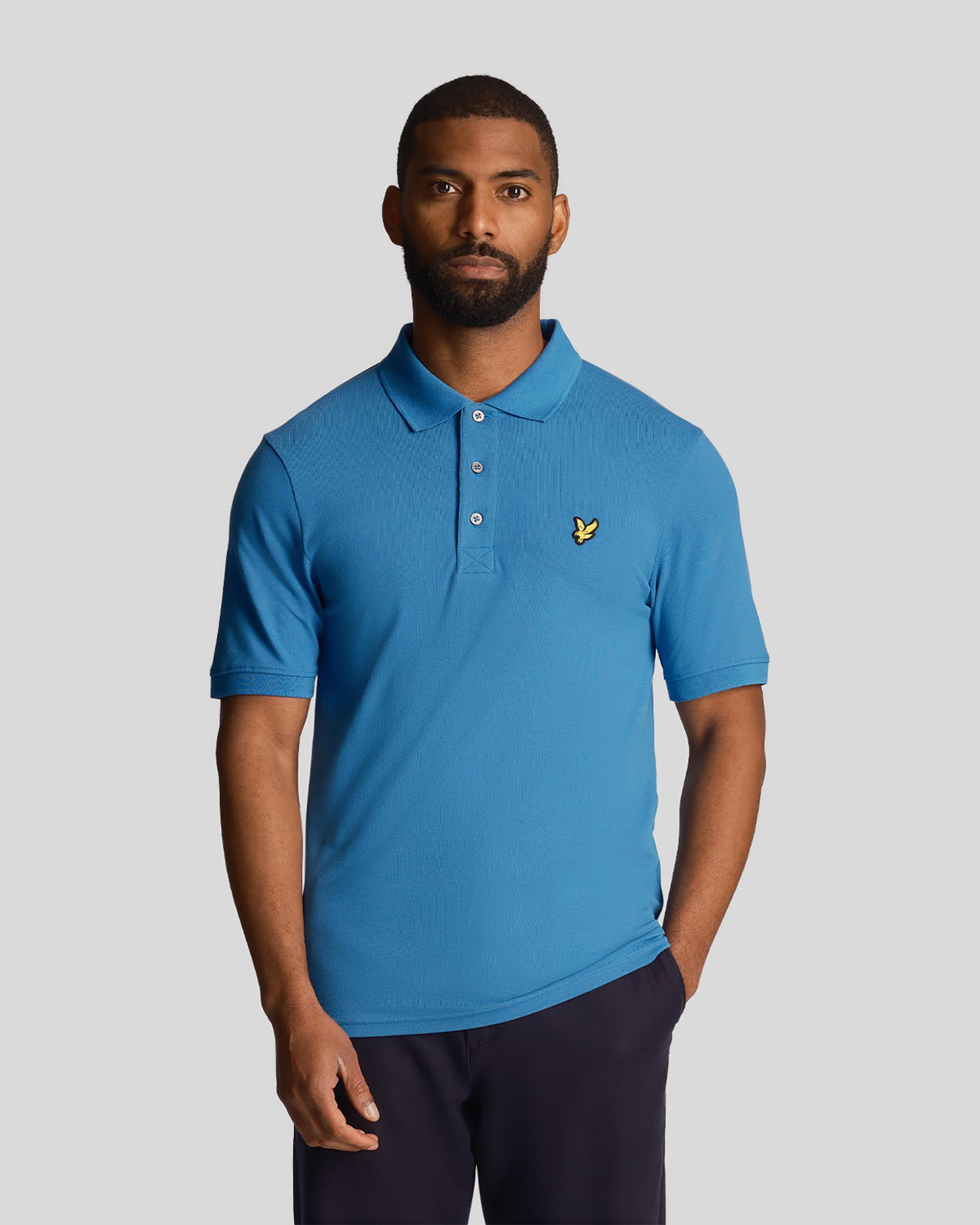 Polo blu royal mezza manica in piqu di cotone stretch con logo