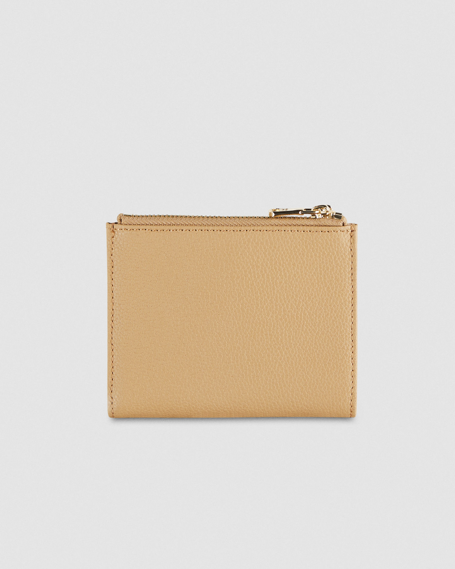 Portafoglio beige in pelle con chiusura a cerniera e apertura a