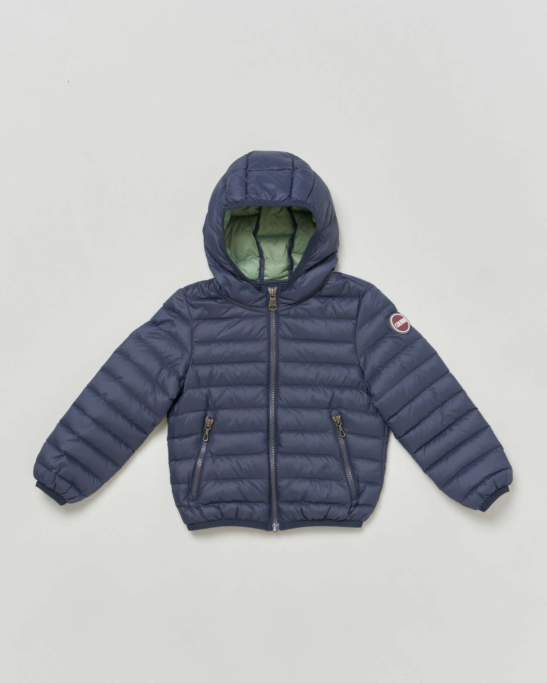 Piumino Colmar blu in nylon imbottito e trapuntato con cappuccio