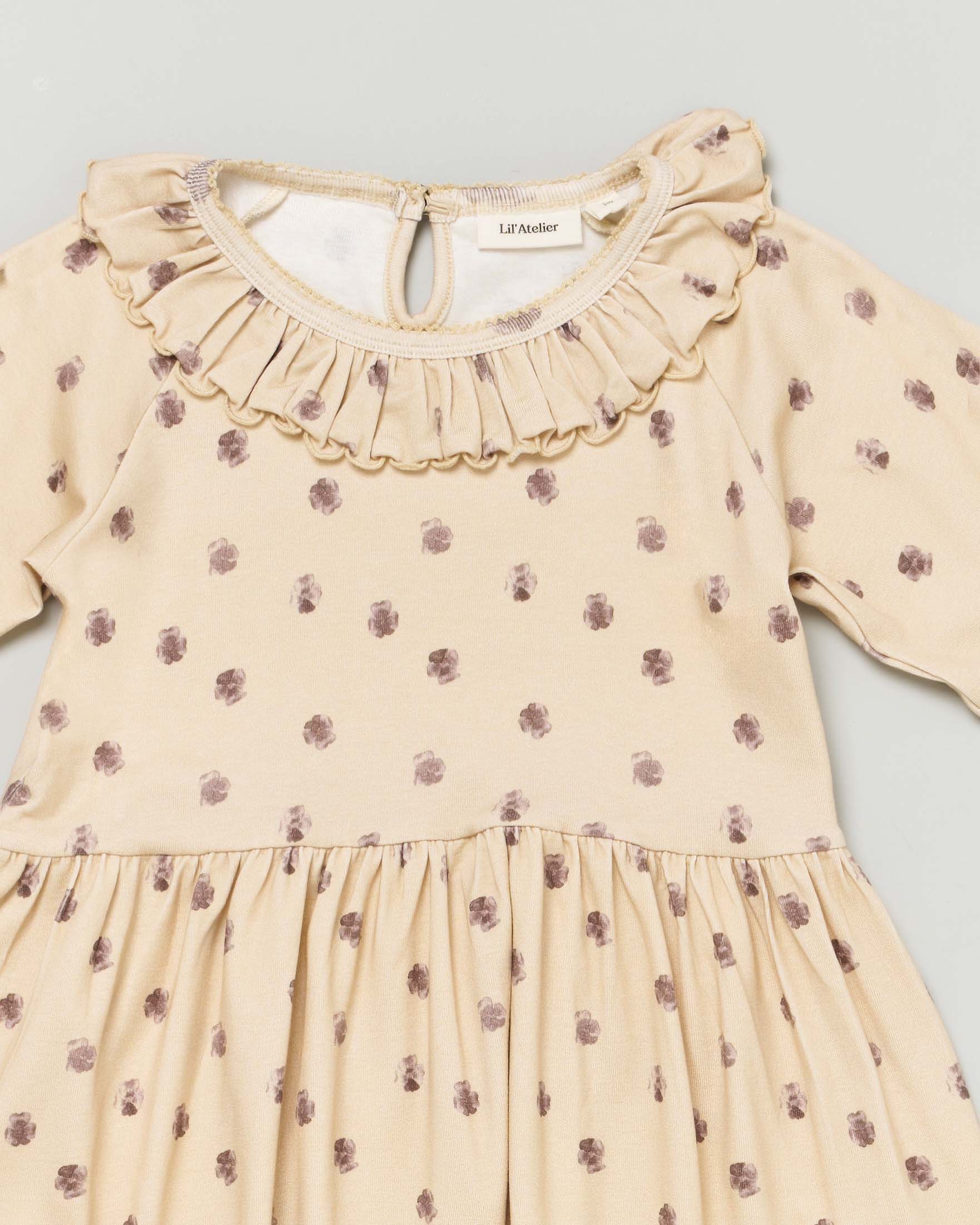 Abito beige in cotone stretch a fantasia floreale malva con maniche a tre quarti e volant 2-7 anni image