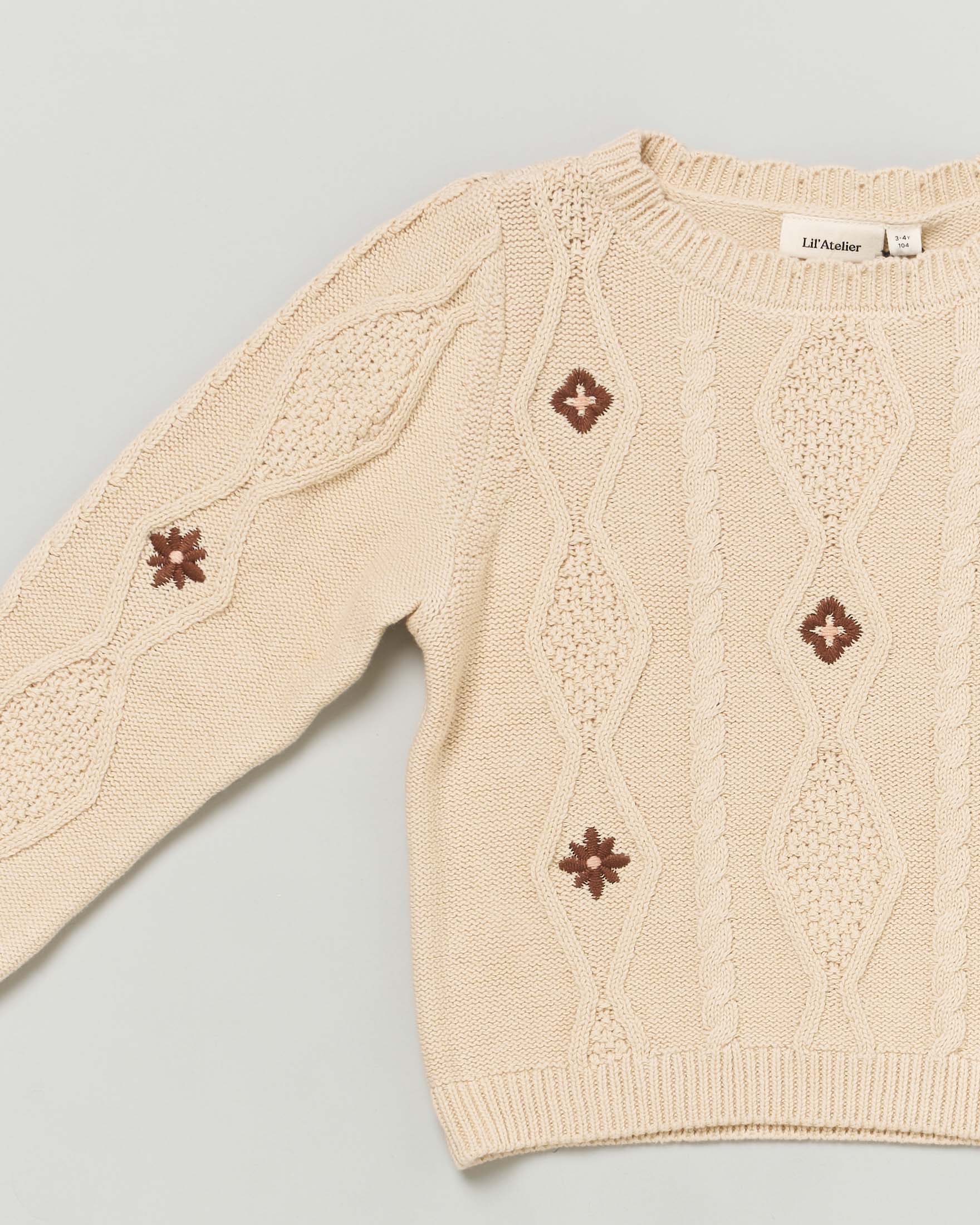 Cardigan beige in cotone con lavotazione jacquard 