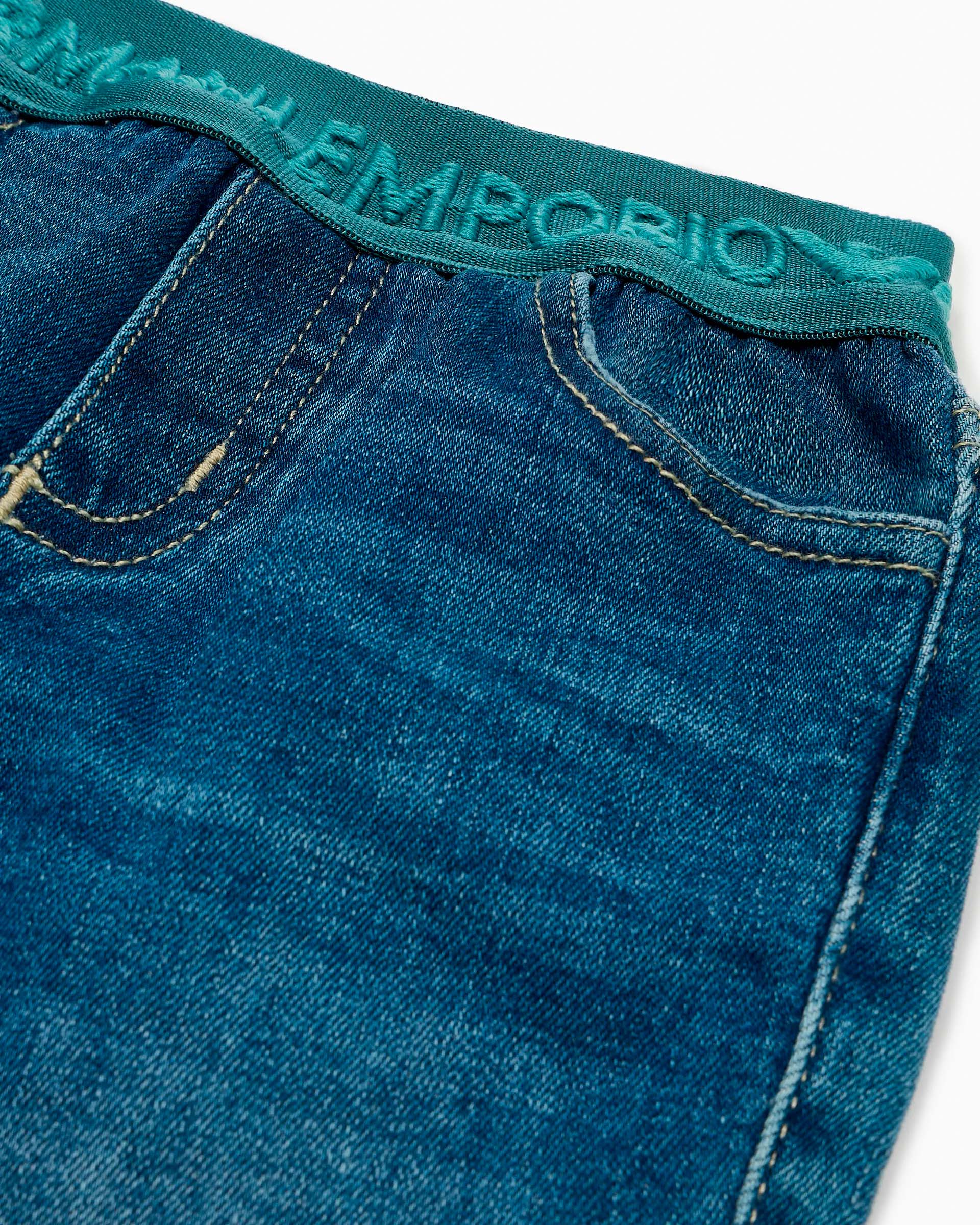 Jeans a lavaggio medio stone washed in cotone stretch con fascia elastica logata ottanio  image