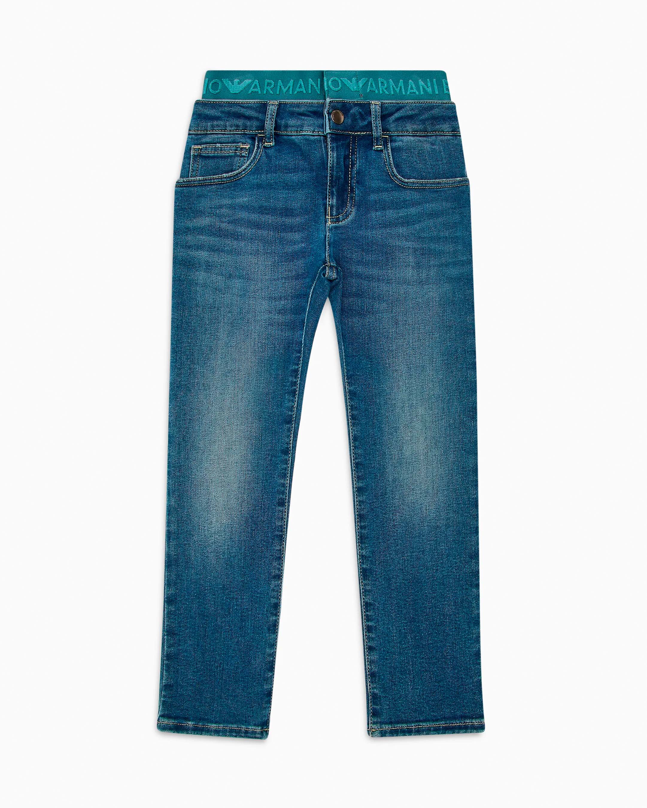 Jeans a lavaggio medio stone washed in cotone stretch con fascia elastica logata ottanio