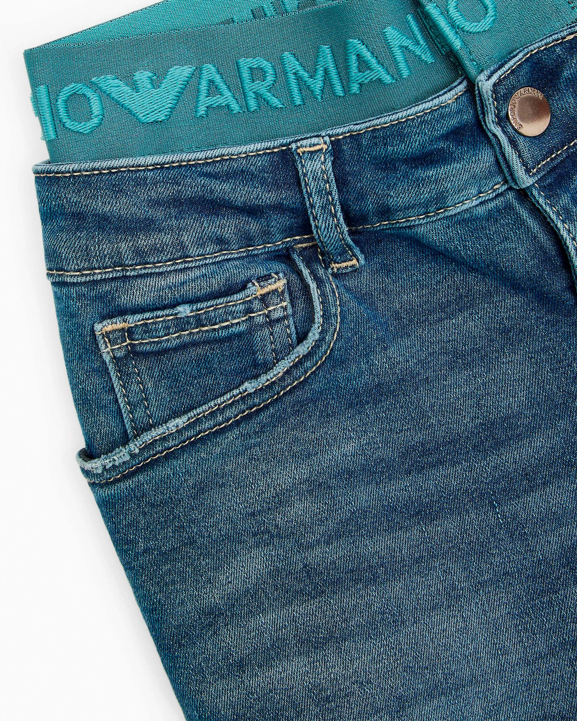 Jeans Emporio Armani a lavaggio medio stone washed in cotone stretch con fascia elastica logata ottanio  image