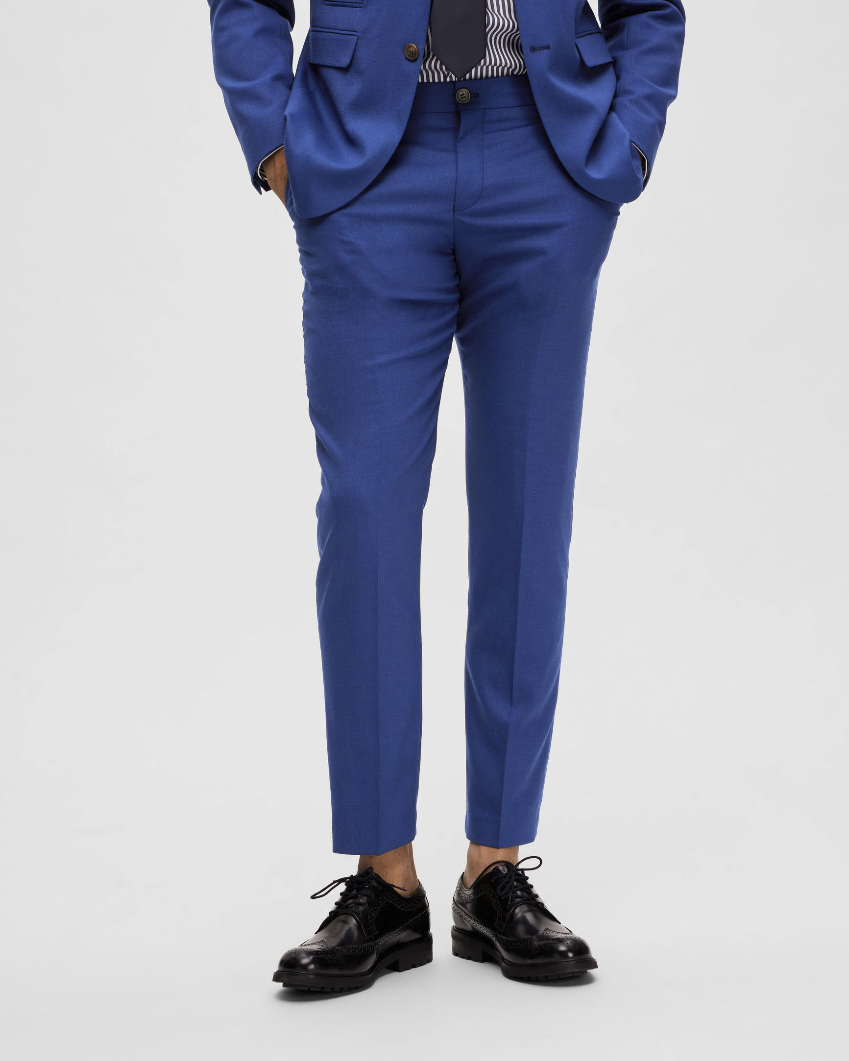 Pantaloni slim blu royal in tela di misto lana stretch microarmatura