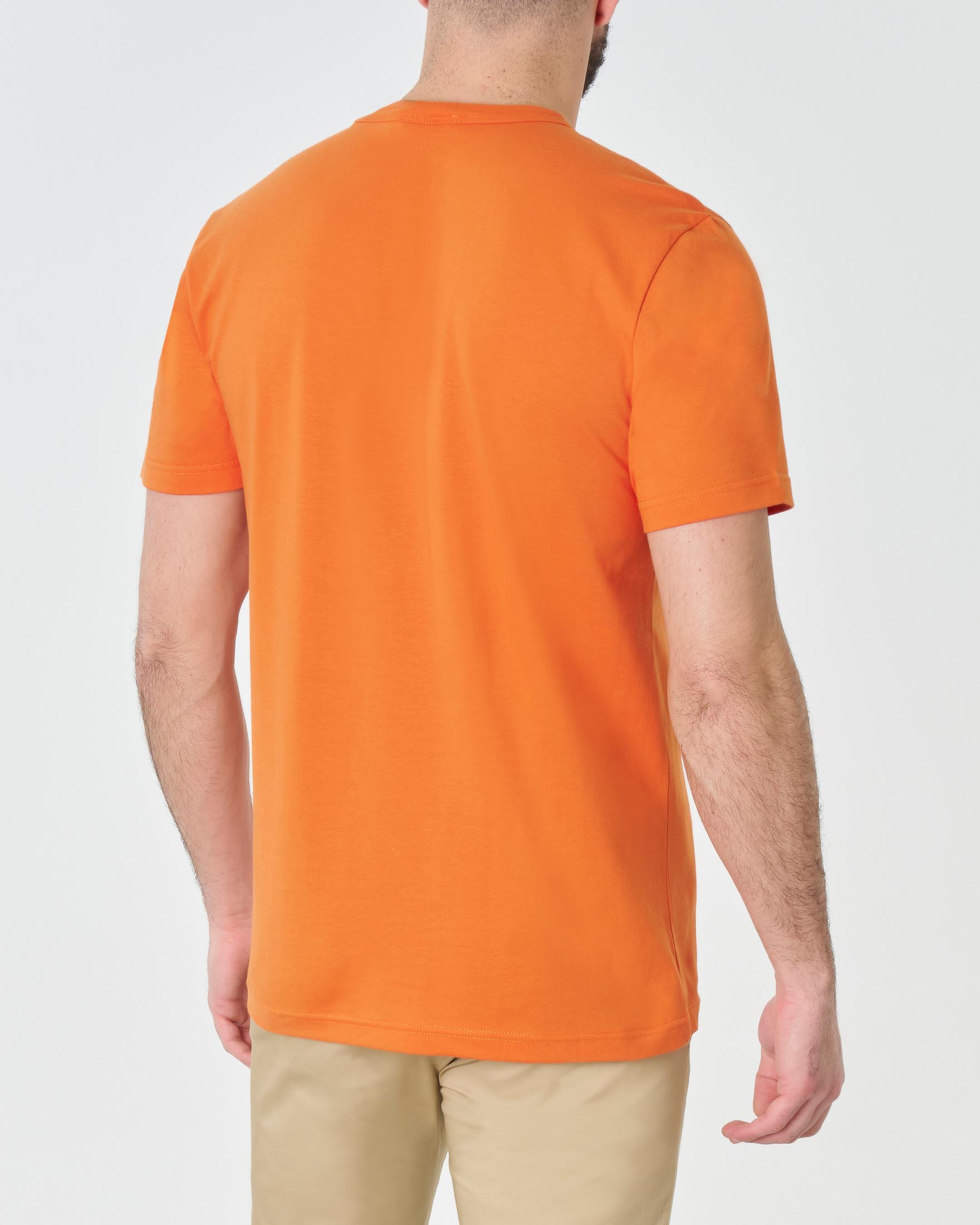 T-shirt mezza manica arancione con logo bollo stampato tono su tono sul petto