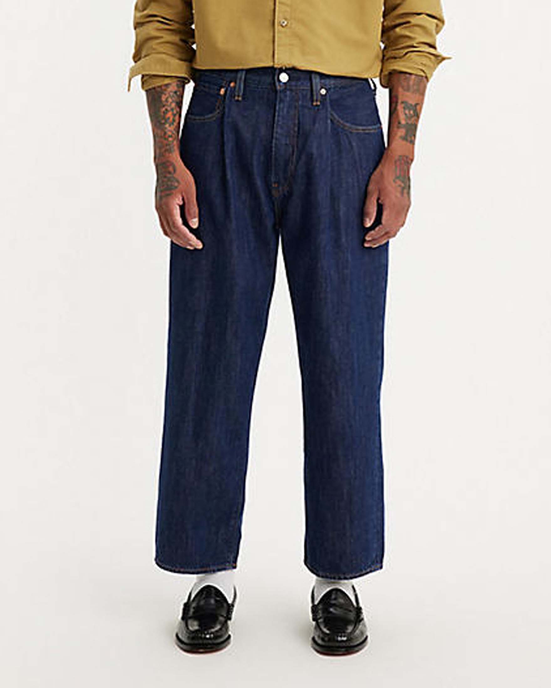 Jeans loose-fit a lavaggio scuro stone washed con pinces