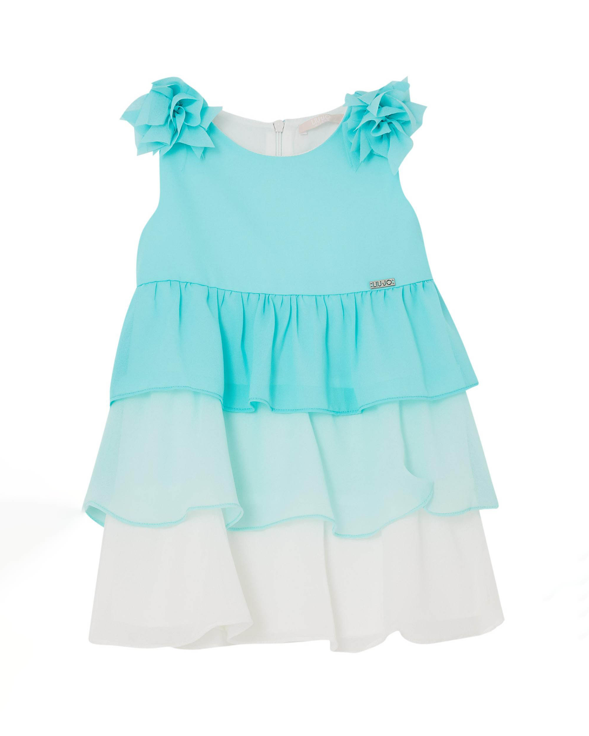 Abito smanicato azzurro e bianco a balze con applicazione floreale sulle spalle