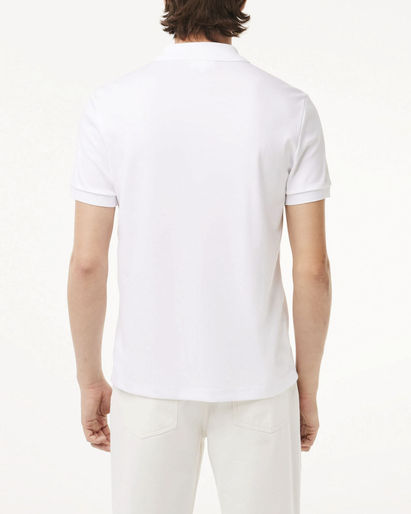 Polo Lacoste bianca mezza manica in jersey leggero image