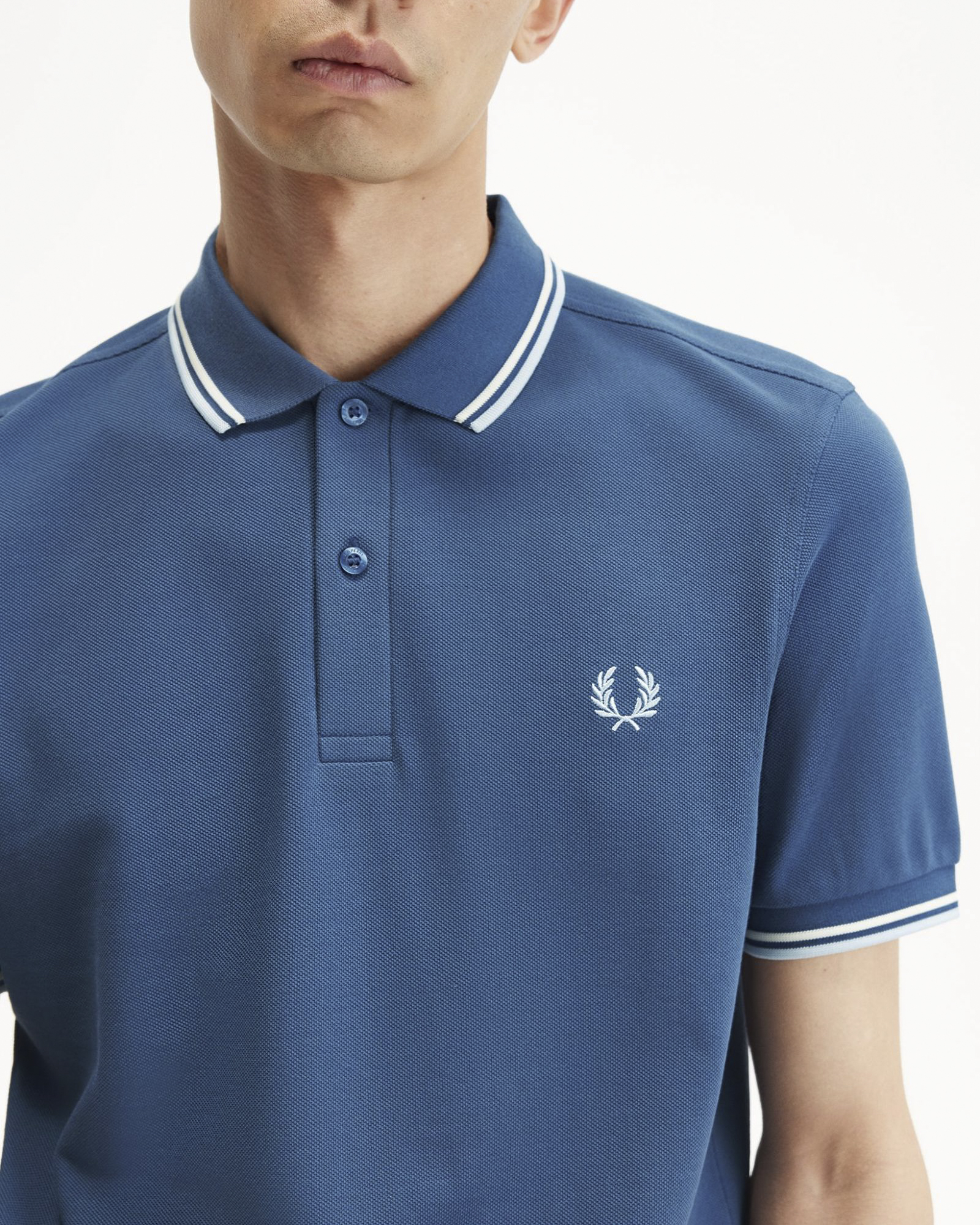 Polo mezza manica blu indaco con bordino azzurro e bianco image