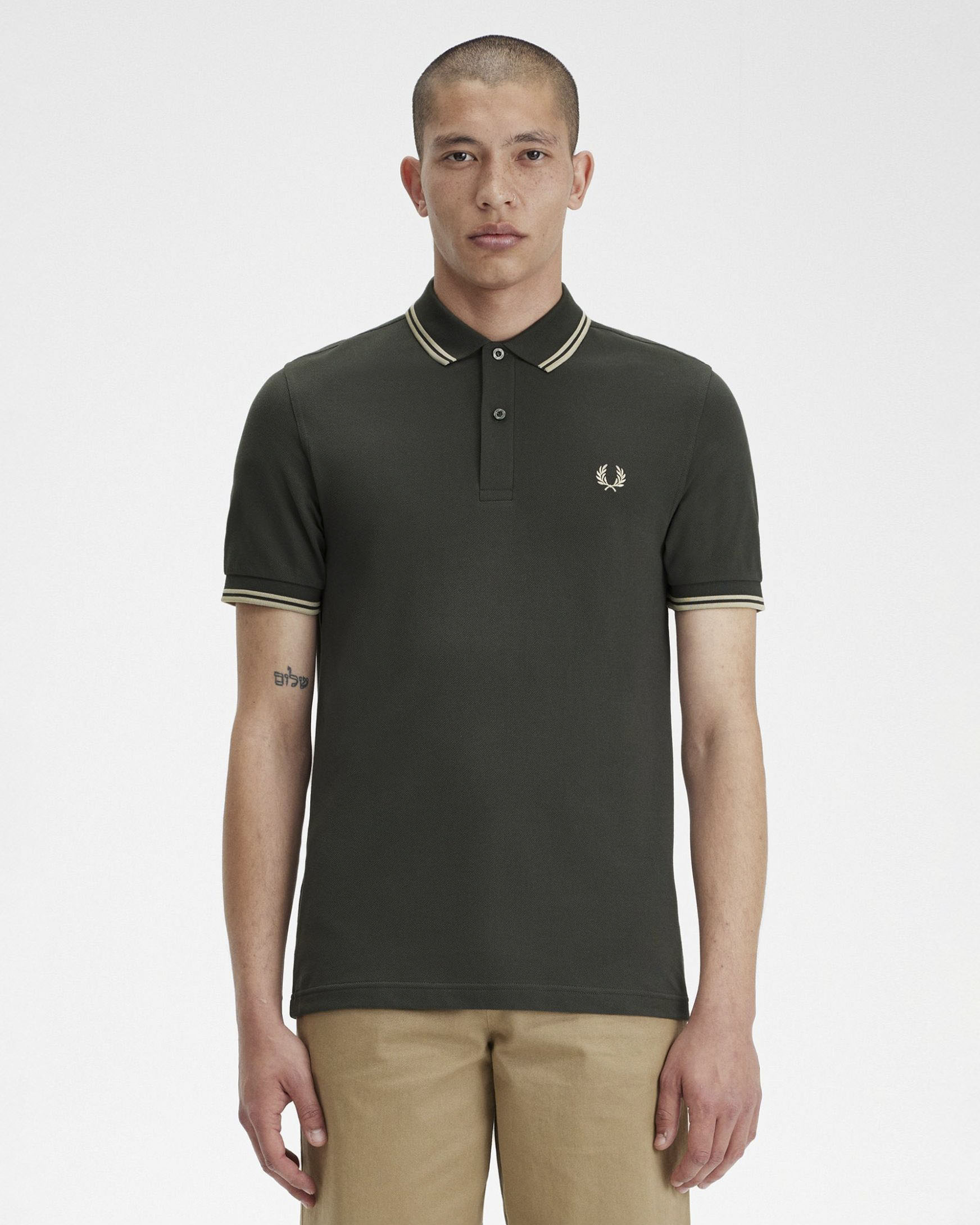 Fred Perry — Polo mezza manica verde scuro con bordino verde menta