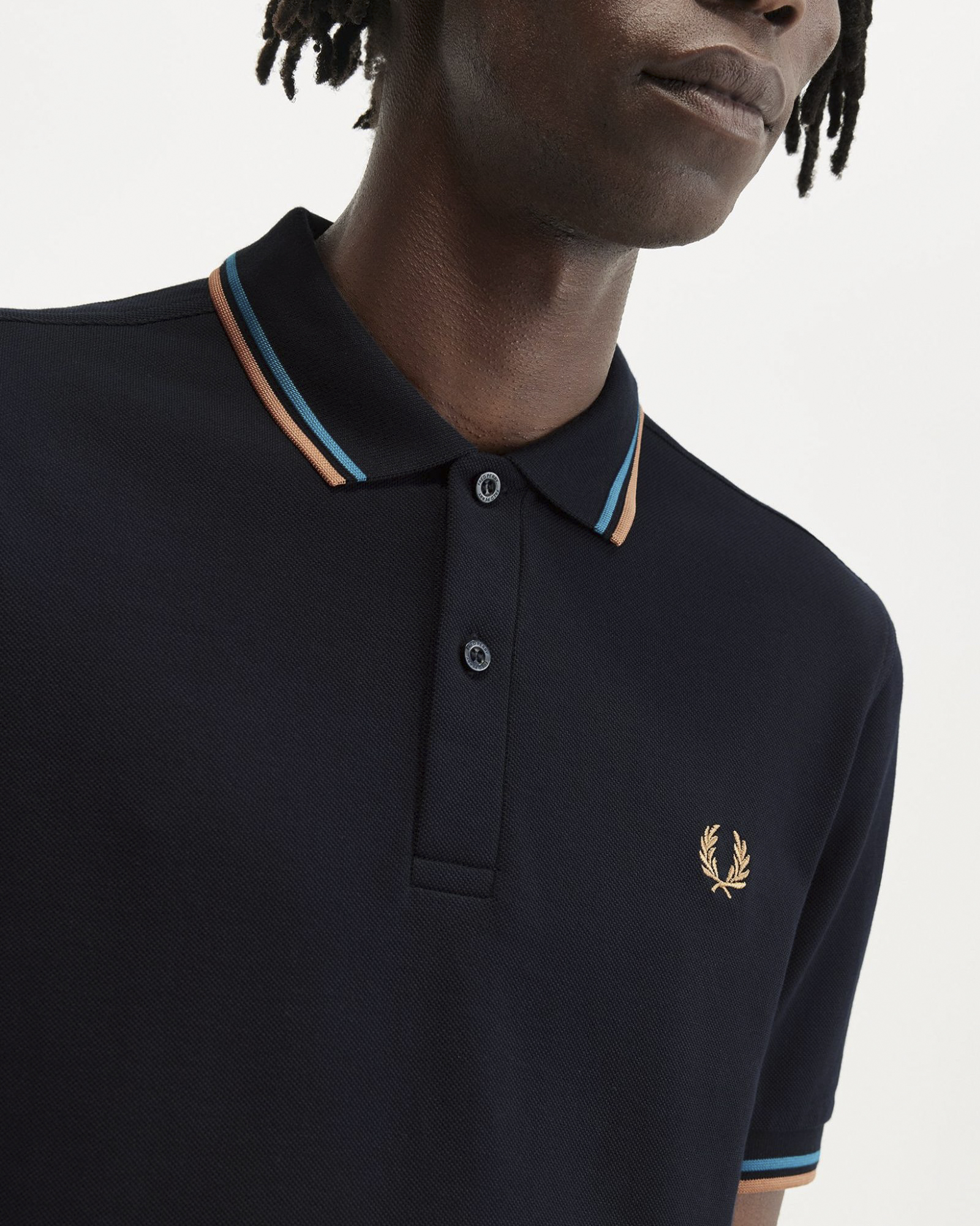 Polo mezza manica blu con bordino celeste e salmone image