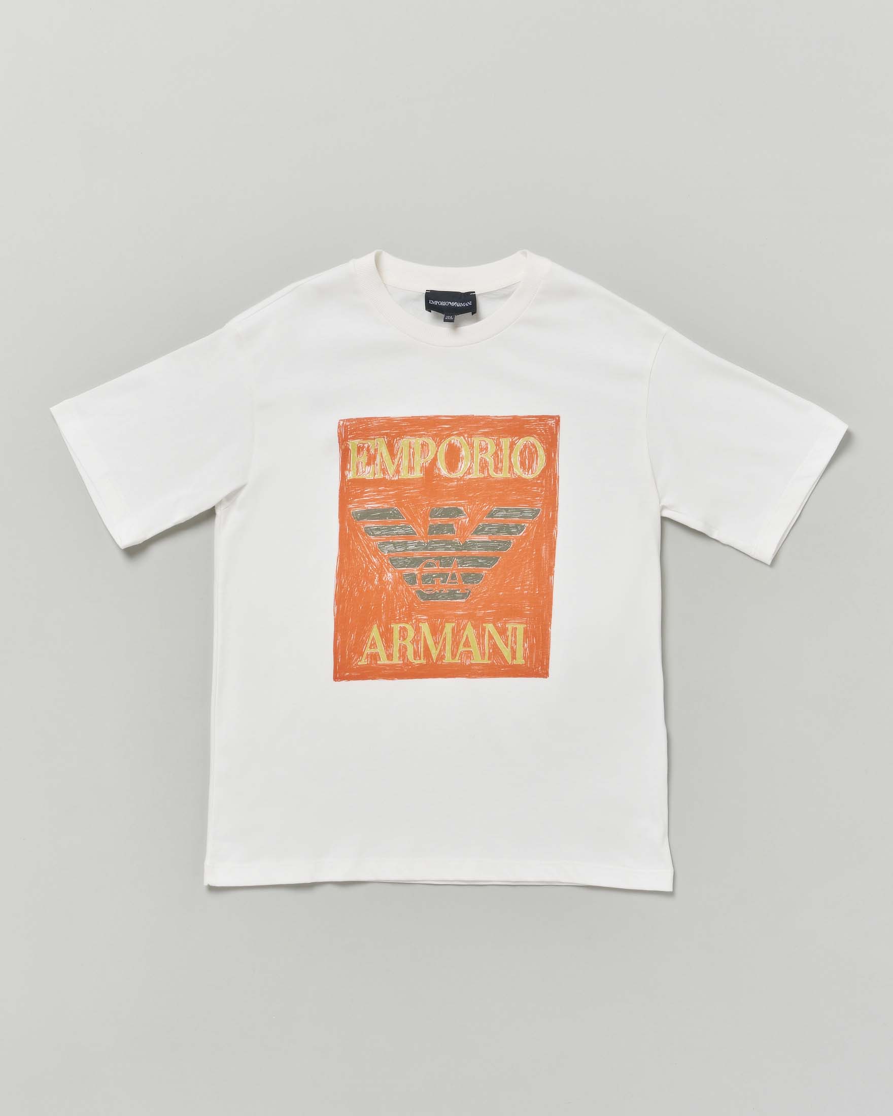 T-shirt Emporio Armani Junior bianca in cotone a maniche corte con maxi stampa logo arancione