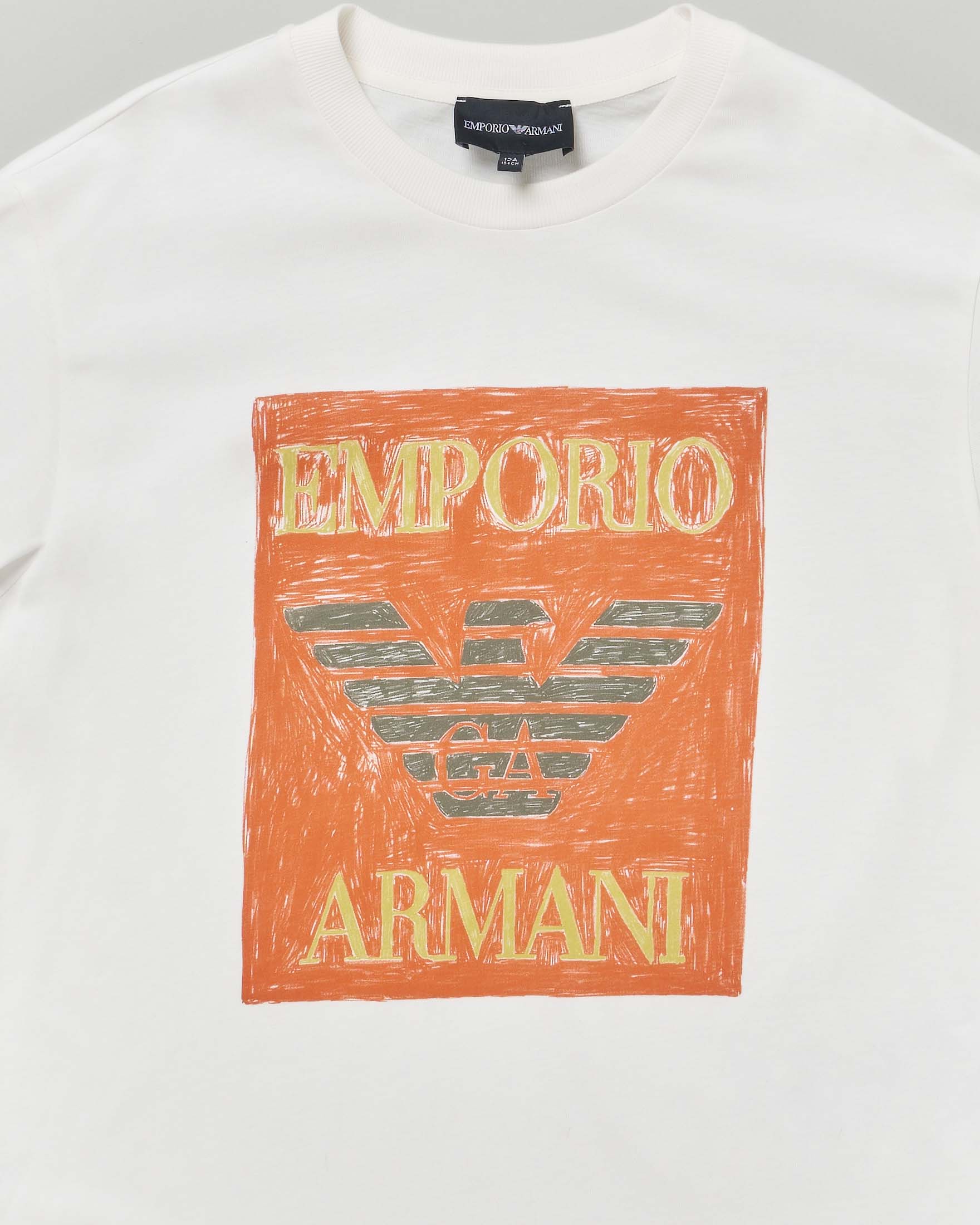 T-shirt Emporio Armani Junior bianca in cotone a maniche corte con maxi stampa logo arancione image
