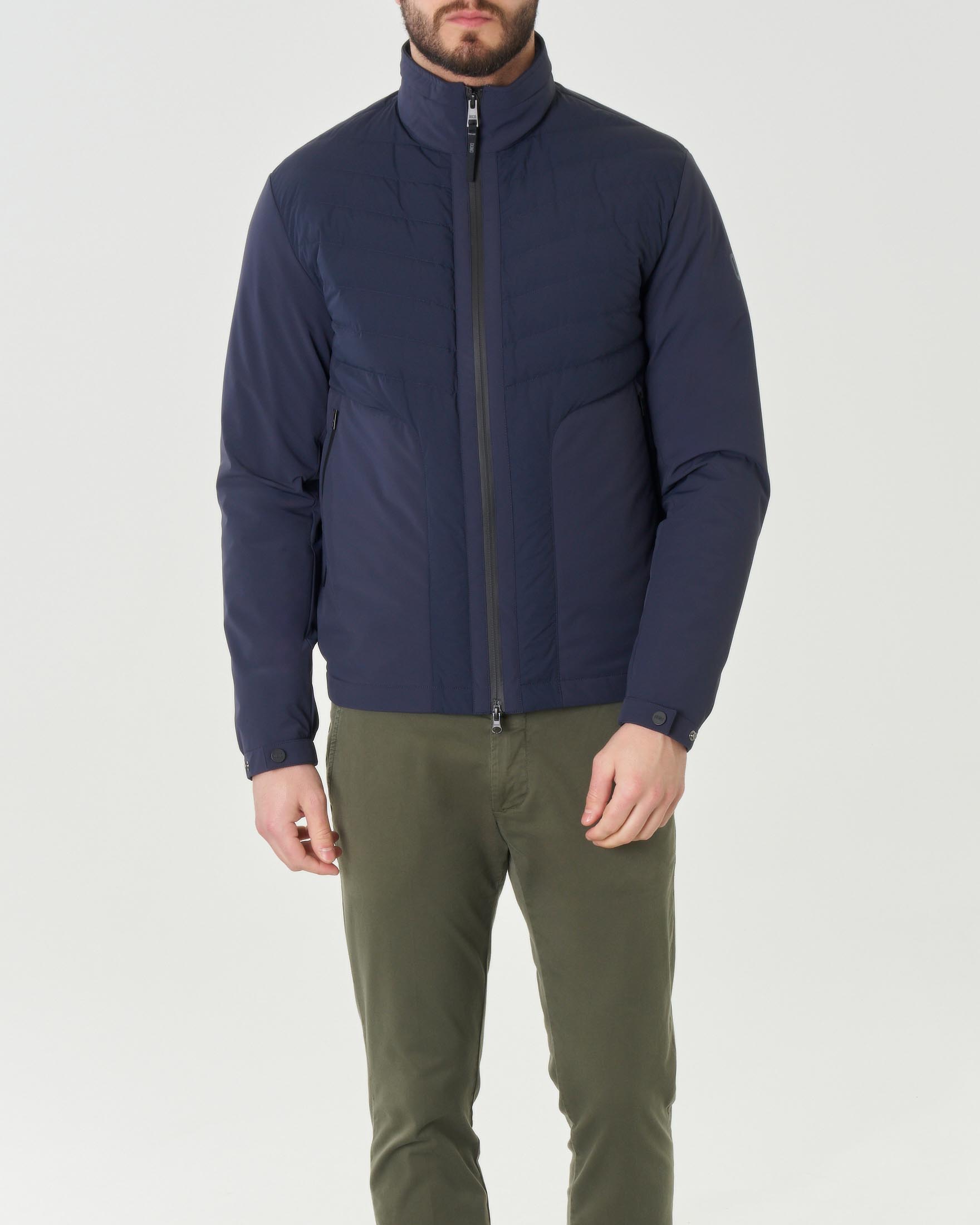 Giubbino bi-materiale blu in tessuto tecnico stretch e nylon trapuntato