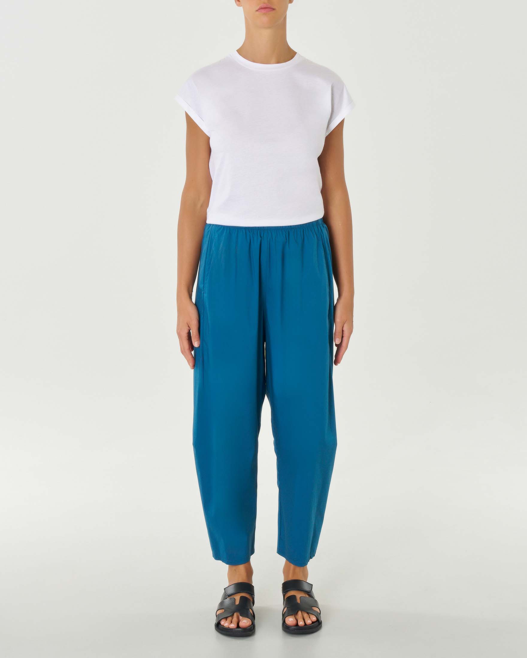 Pantaloni verde petrolio in popeline di cotone stretch dalla linea a pagliaccio