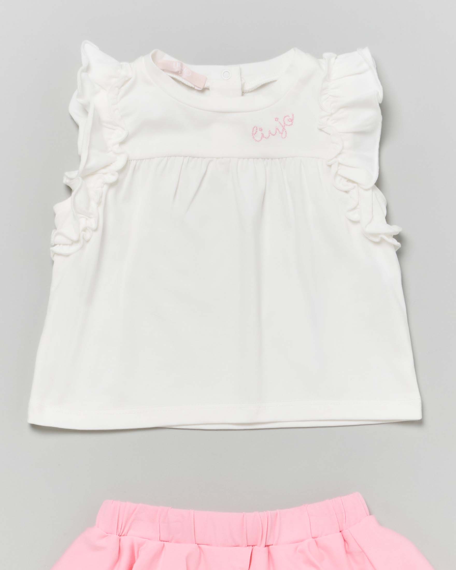 Completo in cotone stretch Liu-Jo composto da canotta bianca e mini gonna rosa image