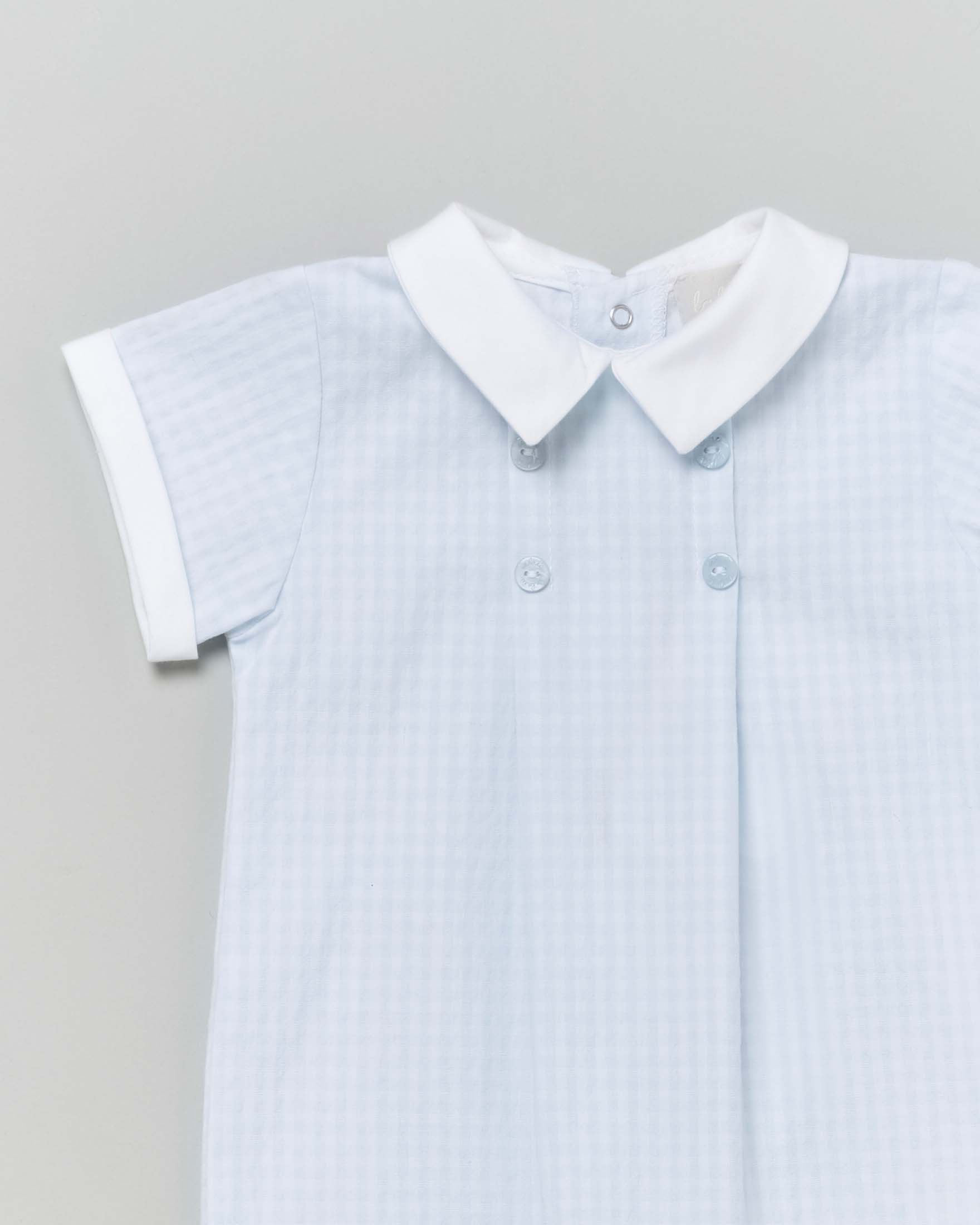 Pagliaccetto Lalalù in misto cotone a fantasia vichy azzurra e bianca a maniche corte image