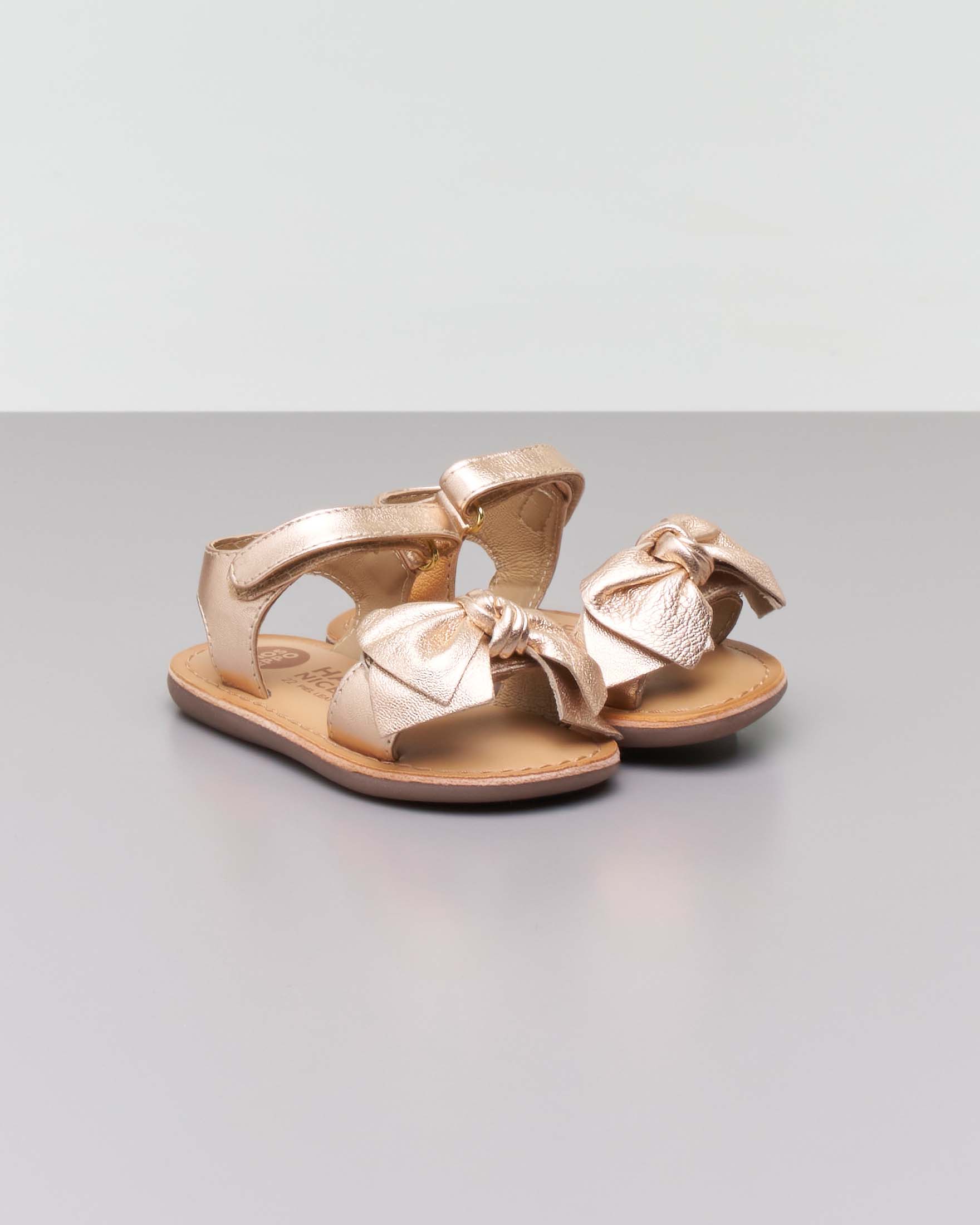 Sandali Gioseppo in pelle oro rosato con fiocco e cinturino a strappo image