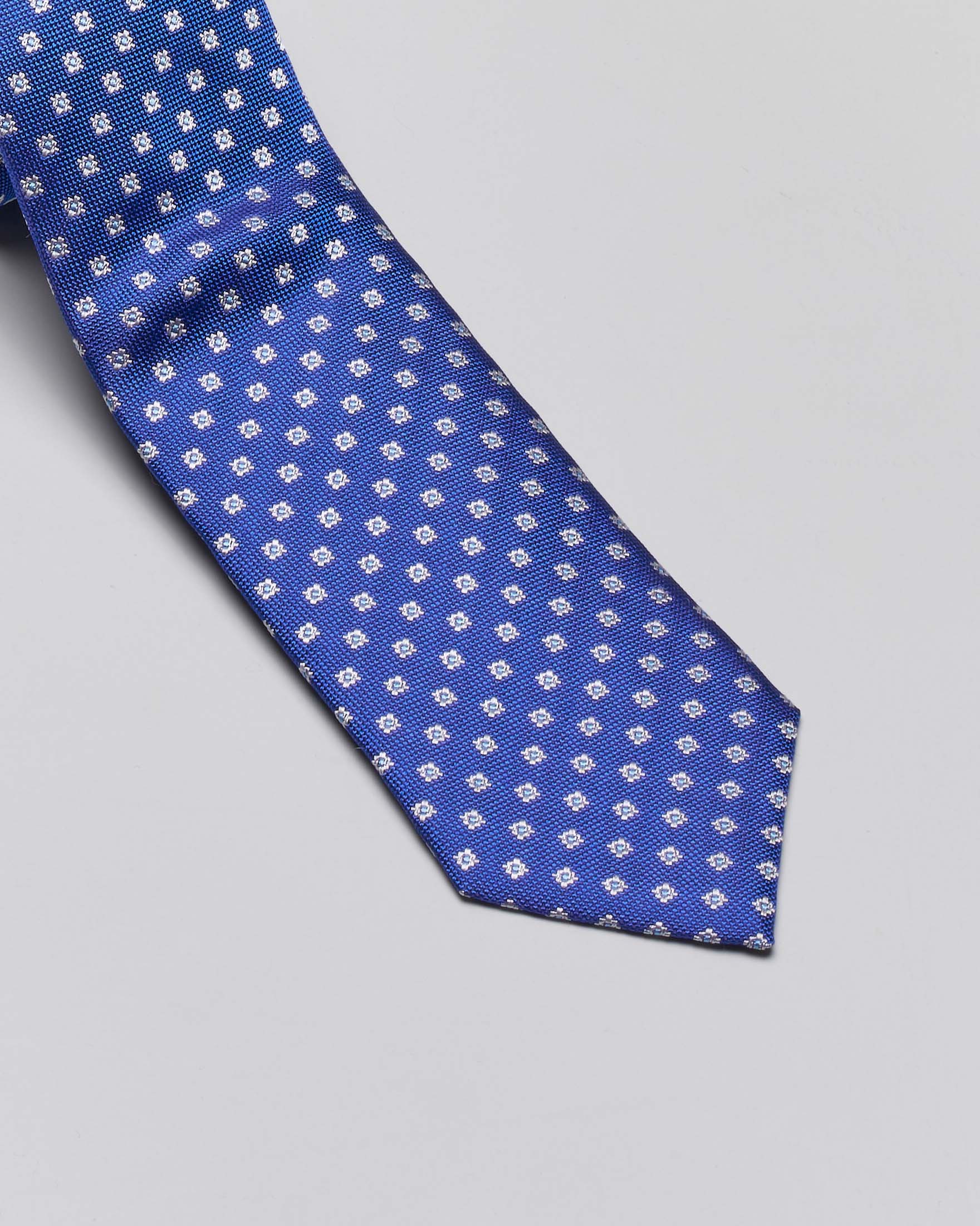 Cravatta blu royal in pura seta a fantasia micro fiori image