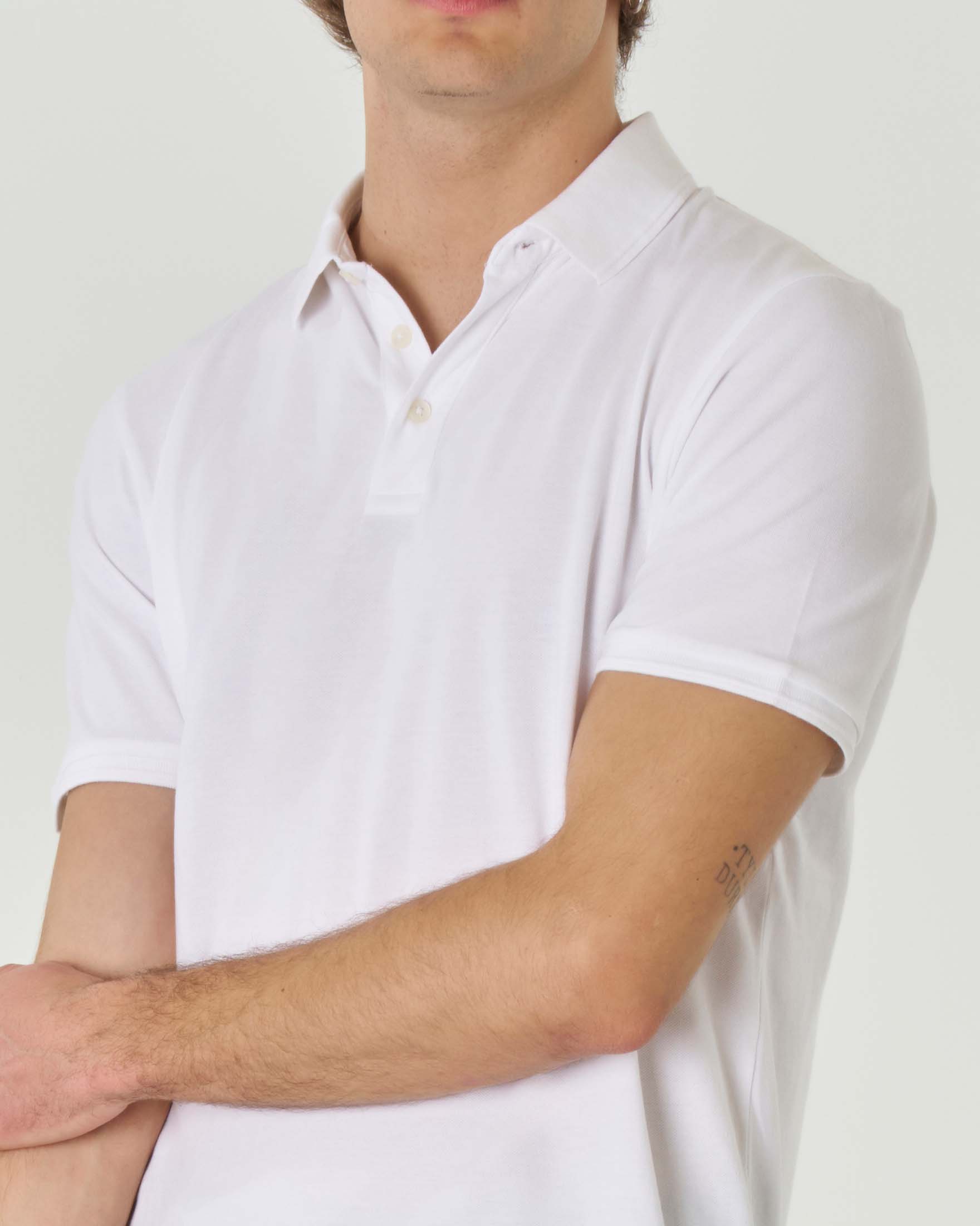Polo bianca mezza manica in piquè di puro cotone regular-fit image