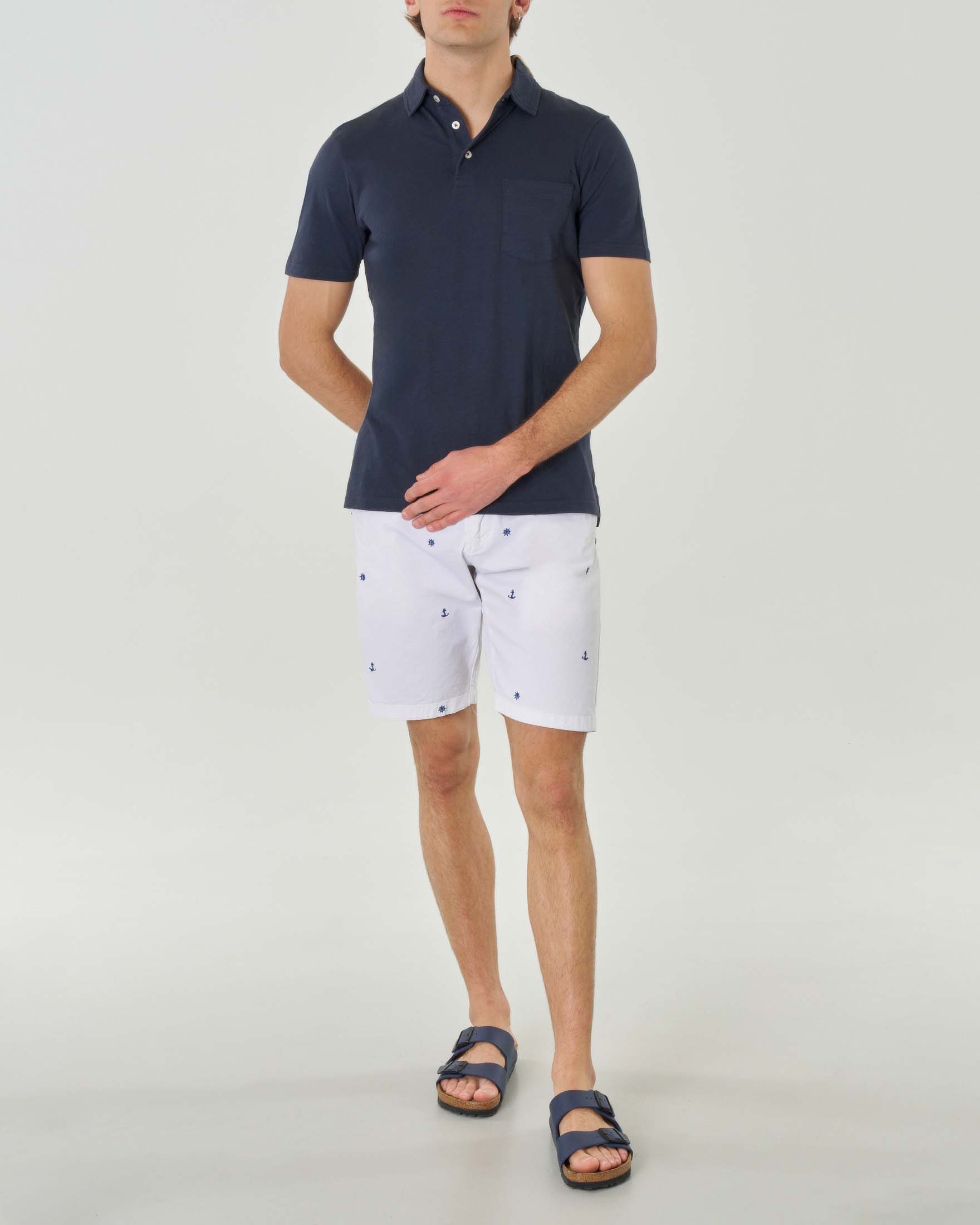 Polo blu mezza manica in cotone fiammato con taschino al petto